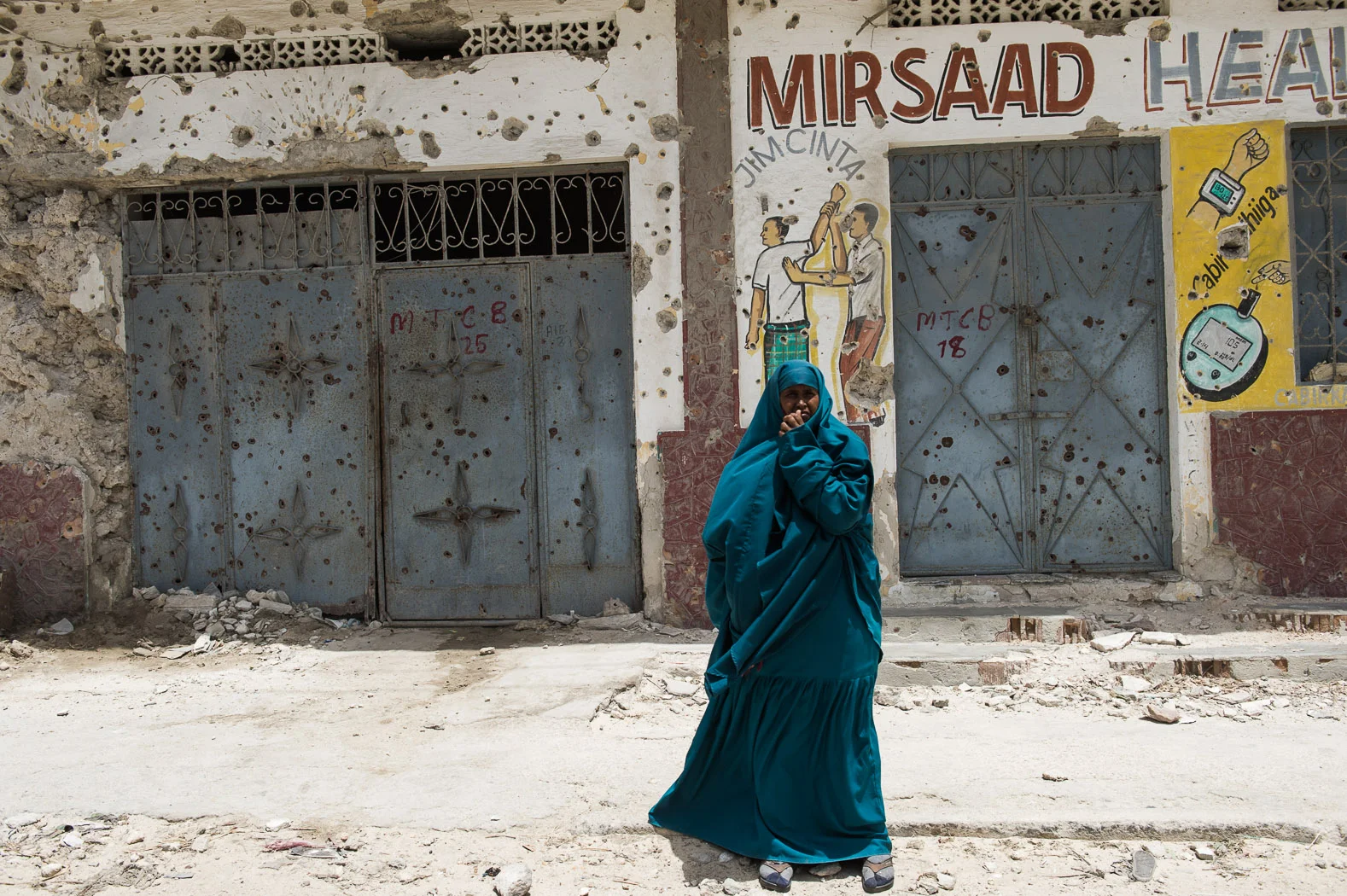 Bullet holes remain as memories of the conflict.