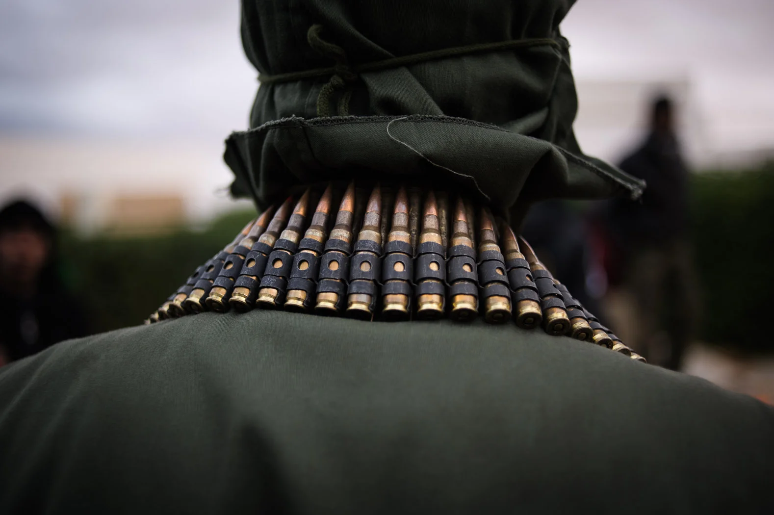 Belts of ammunition adorned the necks, shoulders and waists of many Libyan men.
