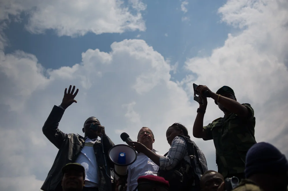 Governor Julien Paluku and UN SRSG Martin Kobler address crowds at Kiwanja, the day after it fell