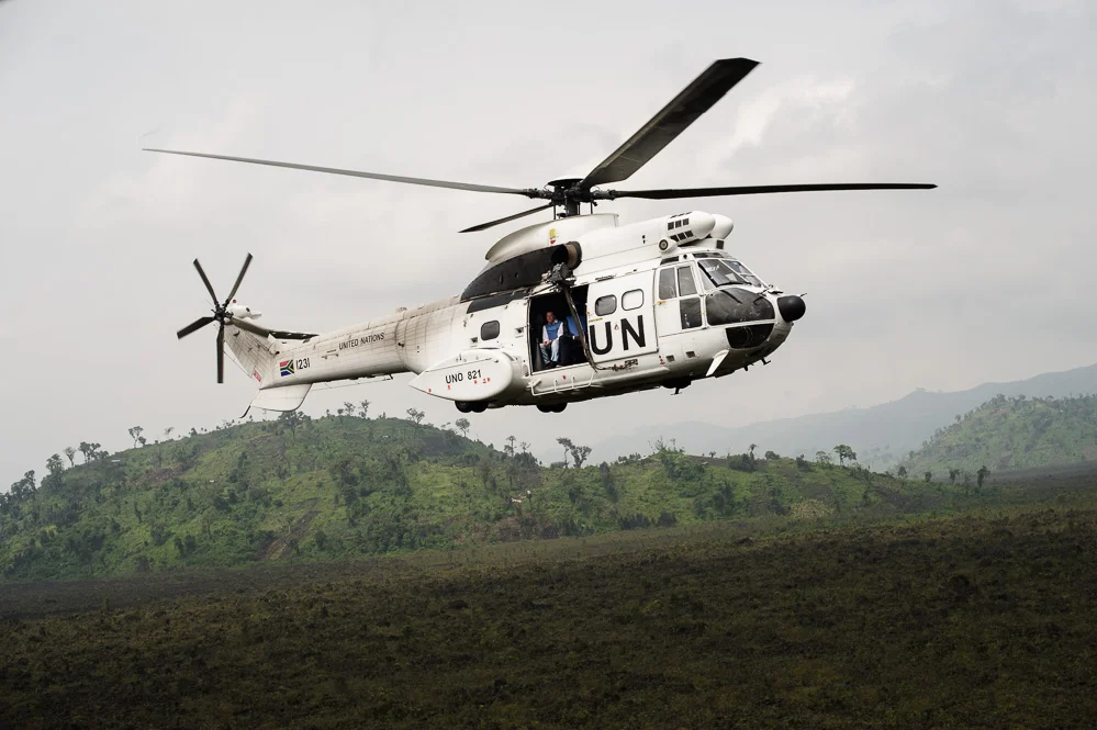 One of our two UN choppers, flying to Kiwanja over the Virunga National Park