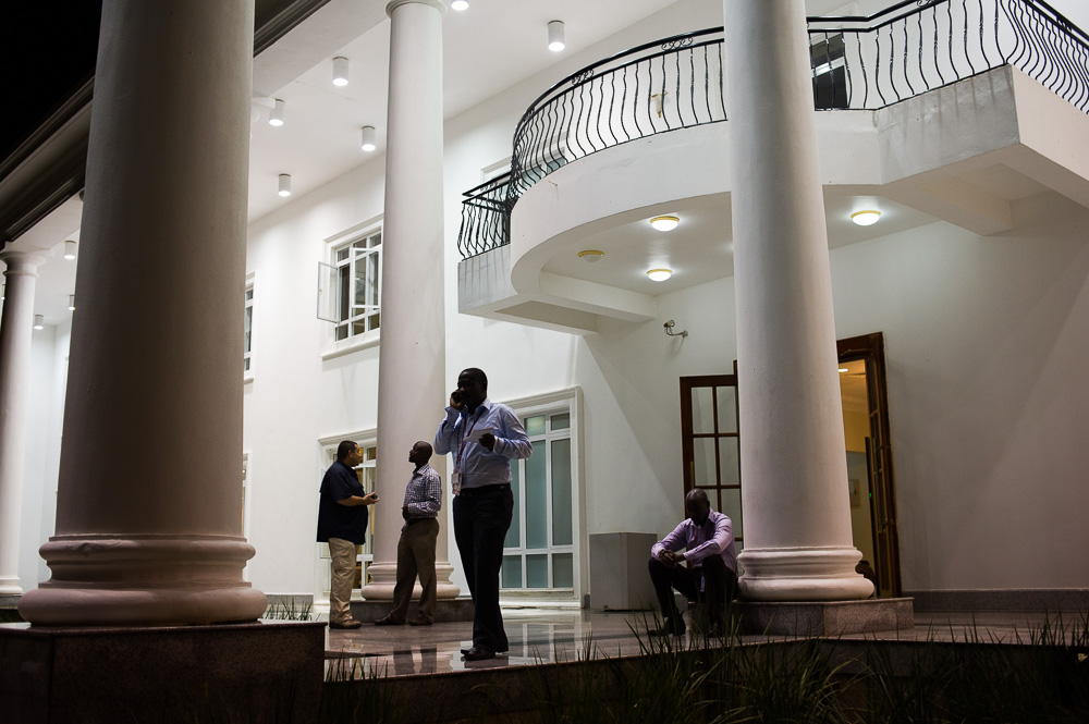  Members of the press make calls outside of State House (phones were banned inside), whilst waiting for something to happen 