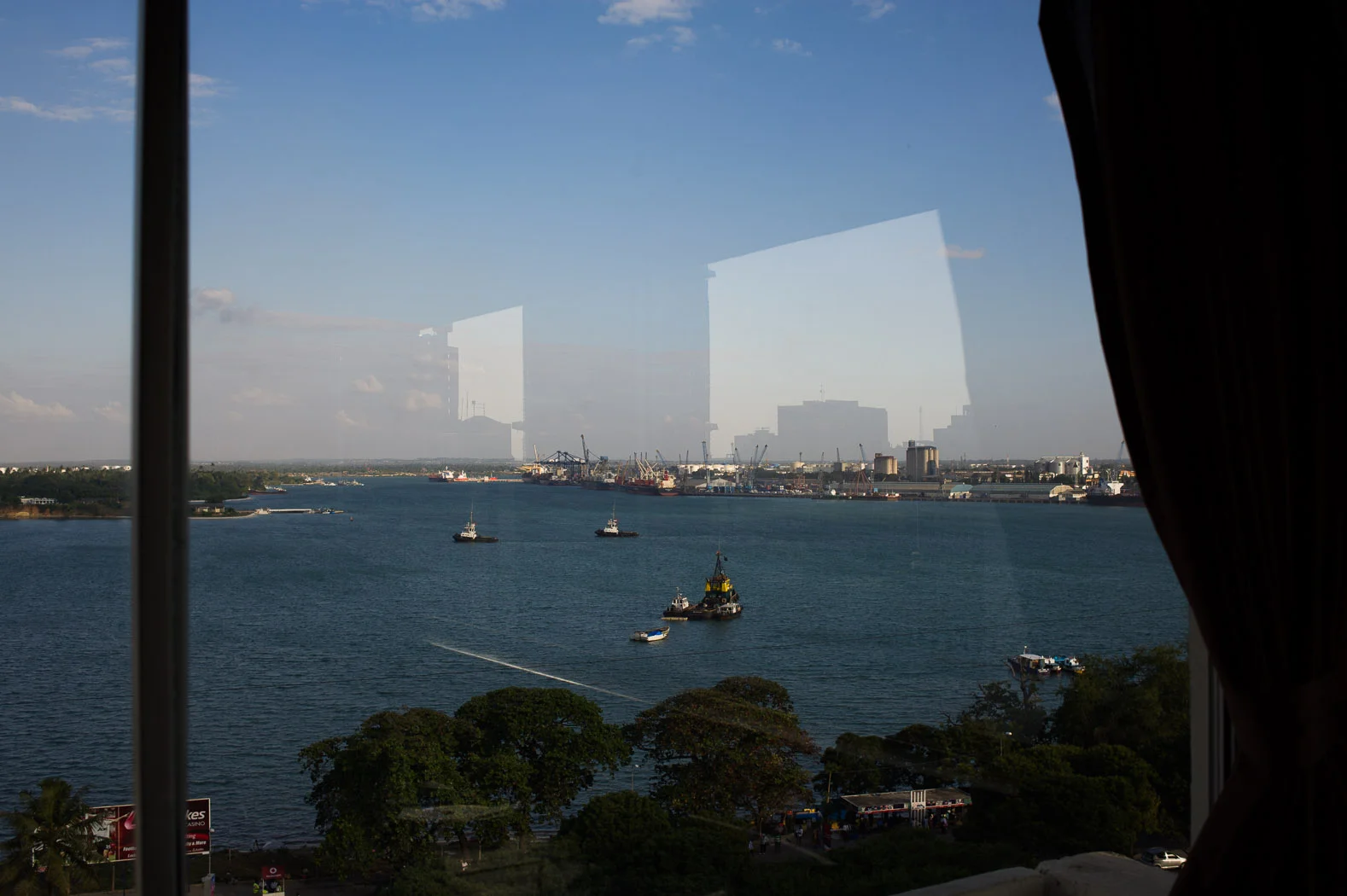A view over the port of Dar es-Salaam, Tanzania's economic hub, as seen from the restaurant of a hotel. The port—to which access is strongly limited—is a major hub for illegal ivory leaving the country to far-eastern markets.