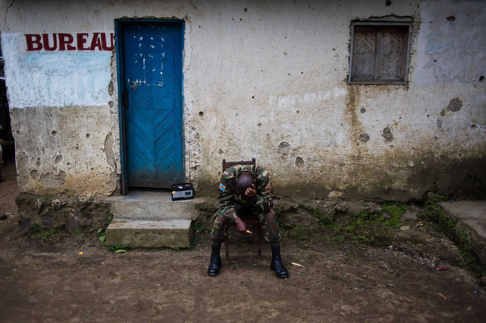 A Congolese army officer rests at a village in territory recently liberated from the rebels.