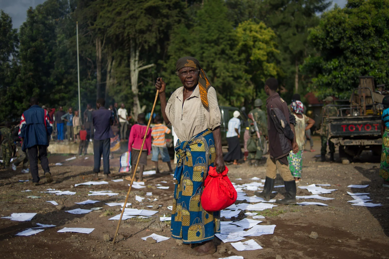A Congolese lady who had fled over the border to Uganda during fighting, arrives back in the town just after the rebels had fled Bunagana. Rebels had held the town for fifteen months.