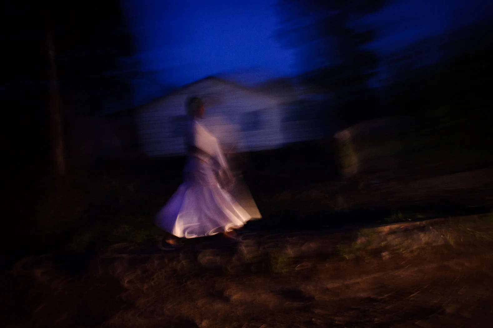 A girl walks towards Goma