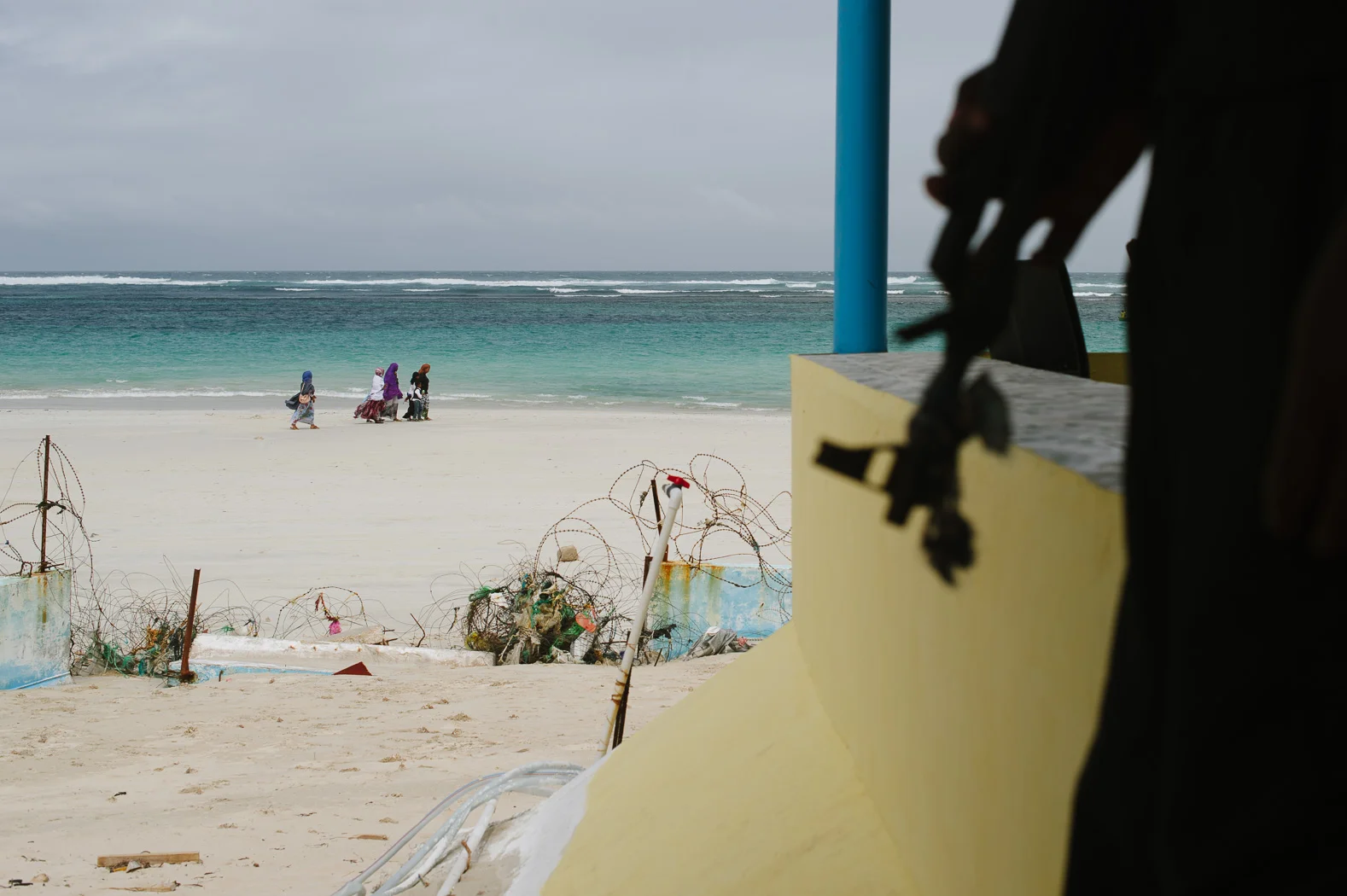 An armed security guard stands in the Lido Beach Seafood restaurant. Despite the increased security in the capital, the restaurant has been the target of suicide bombers.
