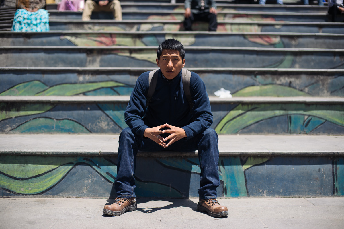 William Walas Cruz (28) poses for a picture in the San Francisco plaza in central La Paz, Bolivia. William helps to run the "New Day Foundation", a centre for shoe-shiners in the Bolivian capital. He is also studying business administration at university in La Paz.