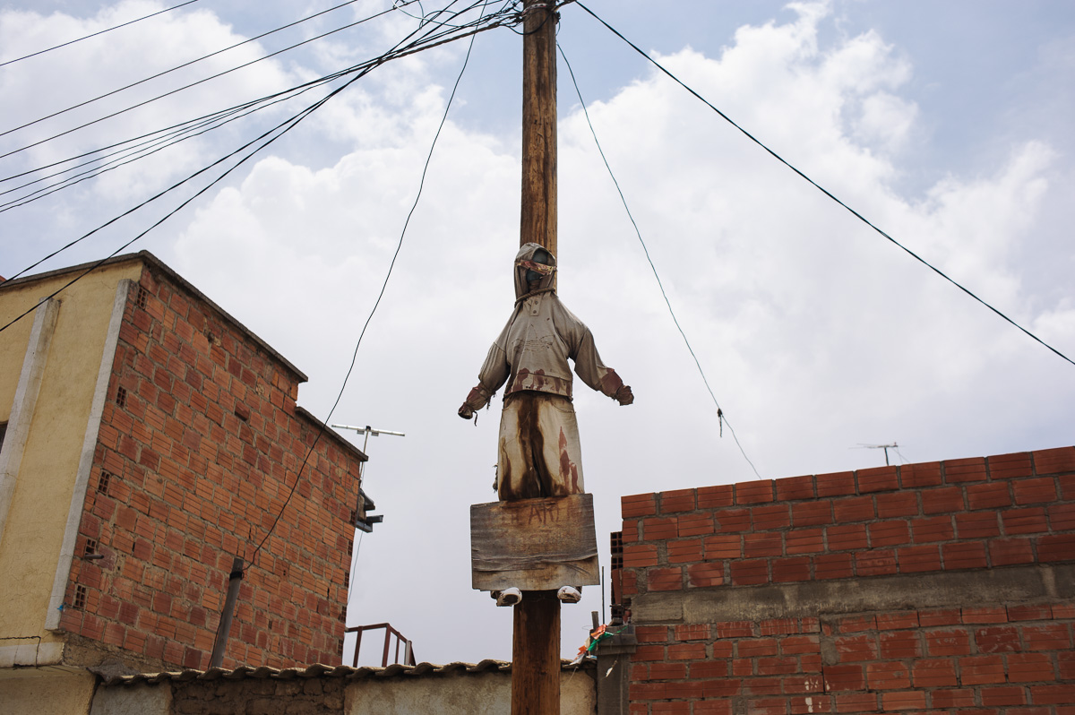 An effigy of a thief hangs from a telegraph pole in a poor neighbourhood in the city of El Alto, the twin-city of La Paz, in Bolivia, as a warning to thieves that if they steal from the neighbourhood, then a similar fate will await them.
