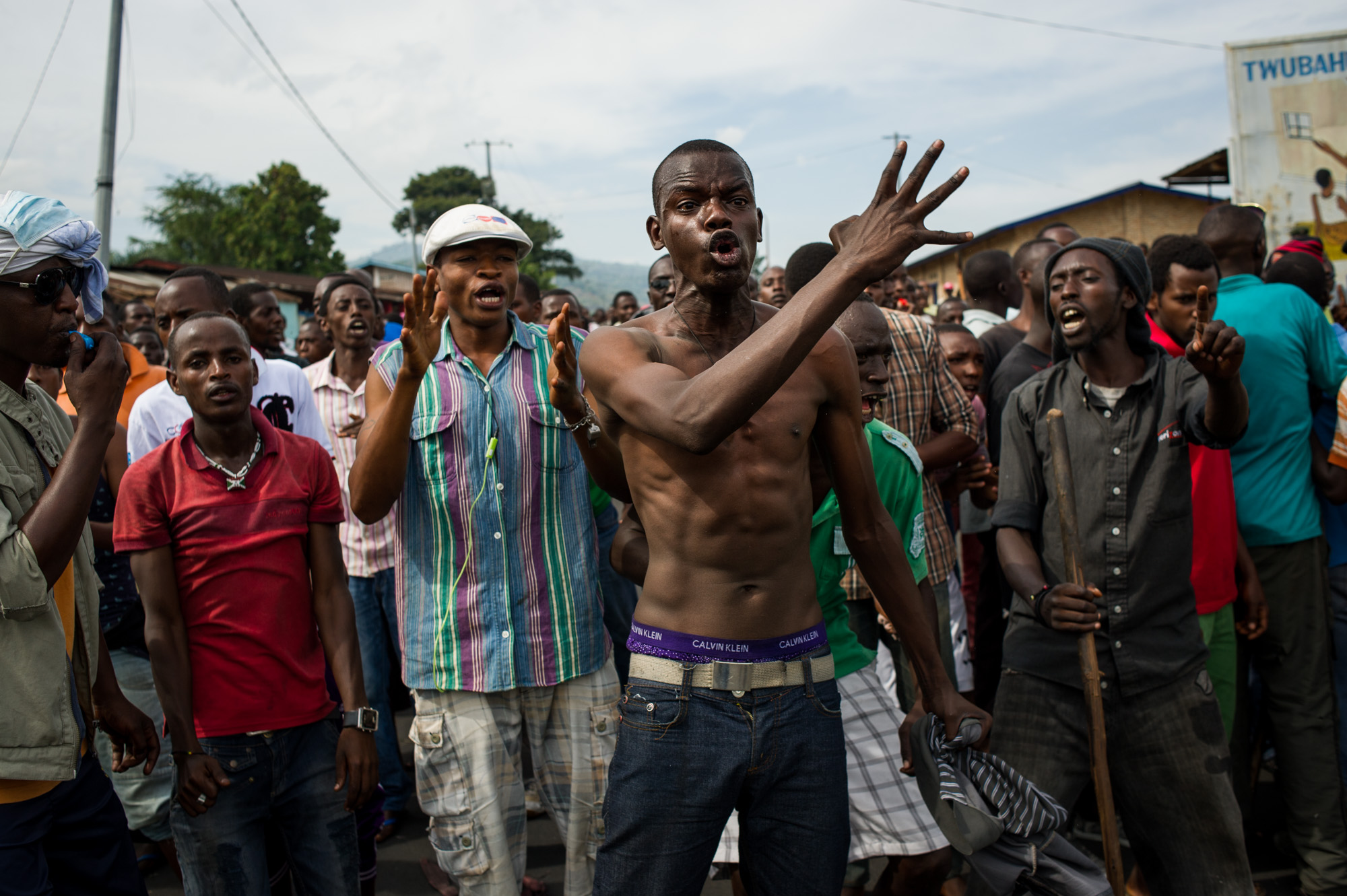 A protestor shouts against the army, who bulldozed a barricade in the Musaga neighbourhood of Bujumbura, Burundi, on May 7, 2015. Tensions between protestors and the army were rising today, with the army clearing a barricade, and protestors accusing soldierse of not doing enough to protect them during clashes police and the Imbonerakure, the youth wing of the ruling CNDD-FDD party.