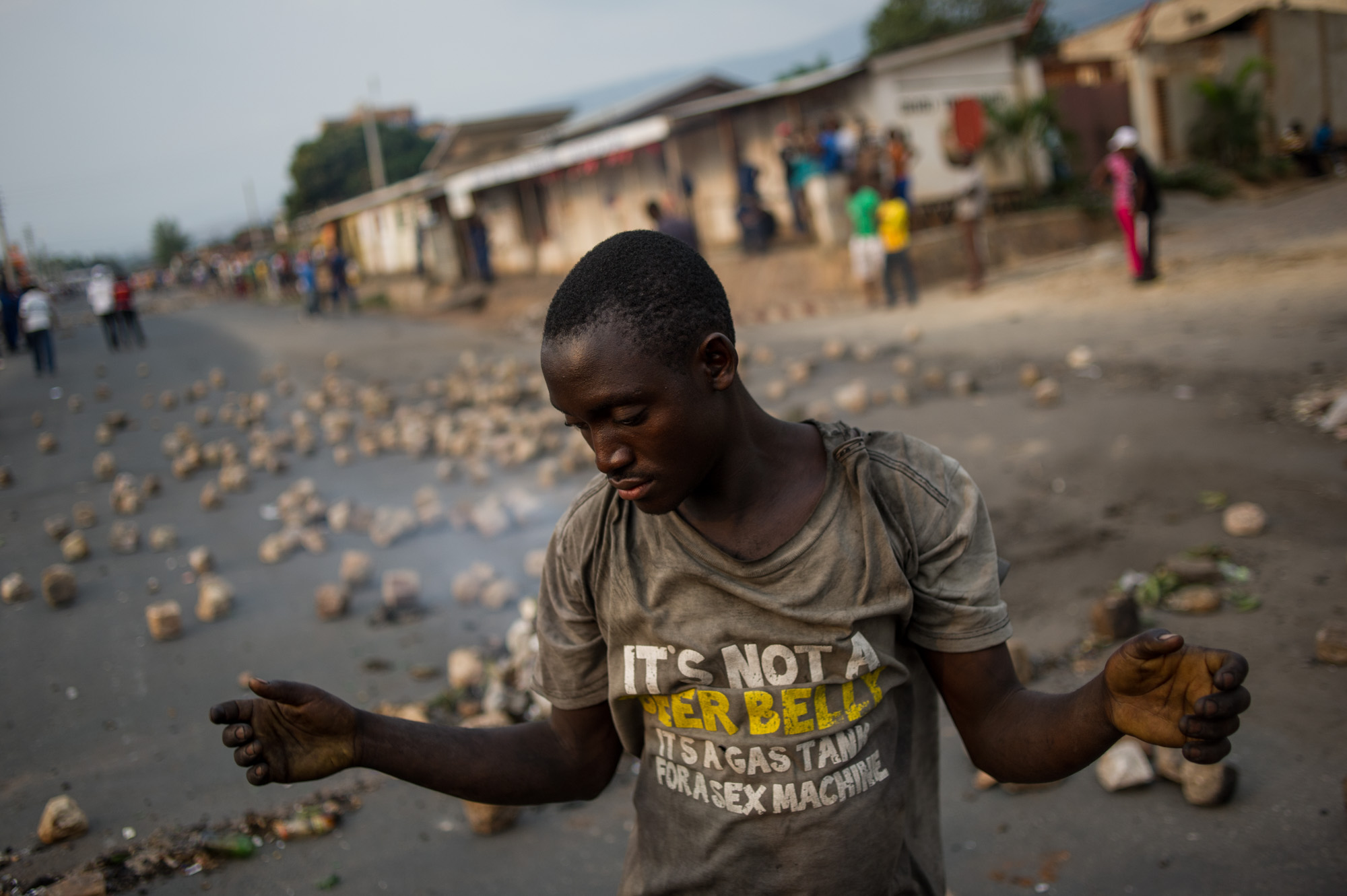 A protestor gestures in the pro-opposition neighbourhood of Nyakabiga after a pro-government candidate tried to hold a rally here.