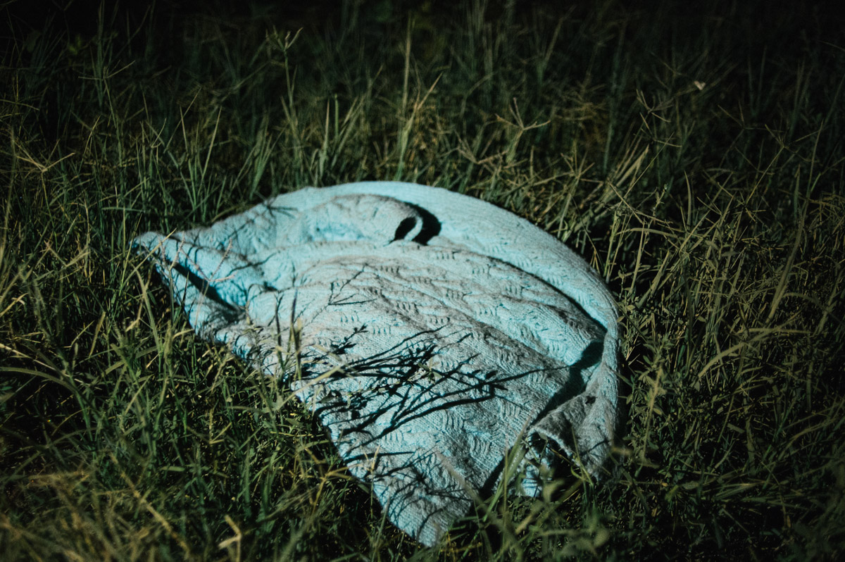 A jumper is left by the side of a track in the fields between the Serbian and Croatian border, pictured during the night of September 17, 2015, near Tovarnik, Croatia.