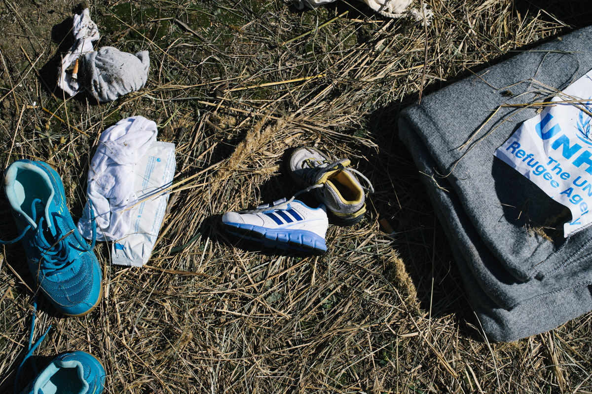 Shoes lay discarded next to a blanket given out by the United Nations Refugee Agency outside a transit centre set-up by Croatian authorities outside the town of Opatovac, Croatia, on September 23, 2015. After thousands of migrants and refugees started passing through Croatia from Serbia, following the Hungarians closing the border between Serbia and Hungary, Croatia struggled to deal with the people crossing its borders. The temporary camp was built for 4000 people, but was quickly overwhelmed.