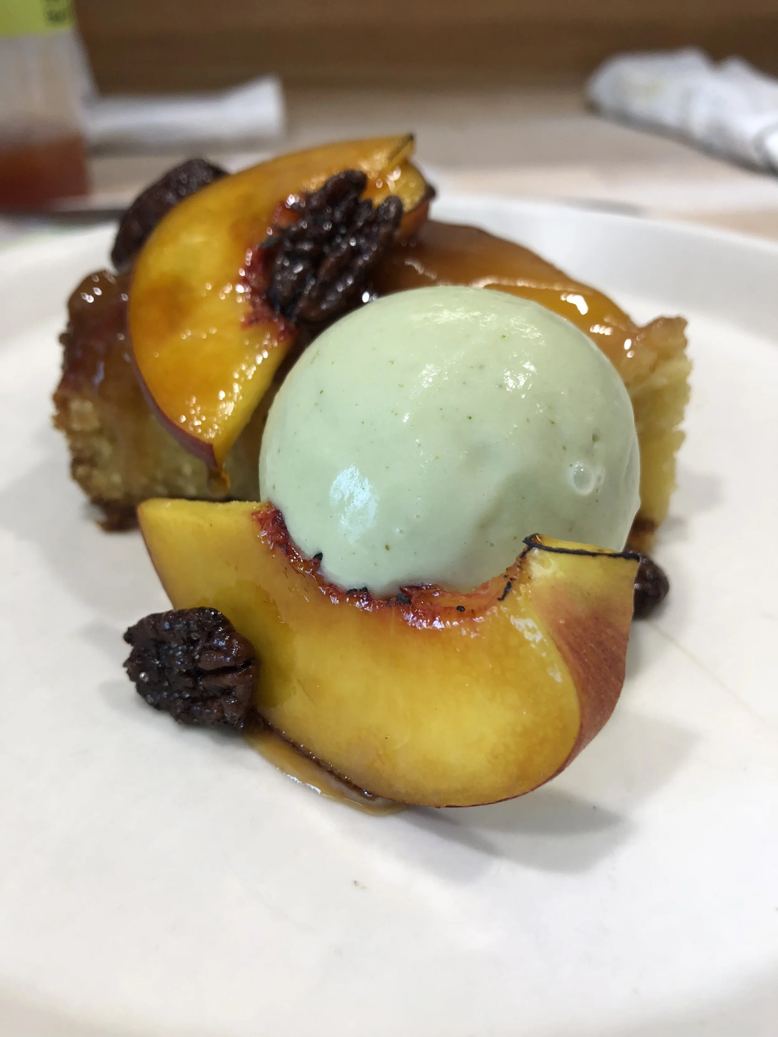Peach Upside-down Cake, olive oil, bay leaf, pecan.