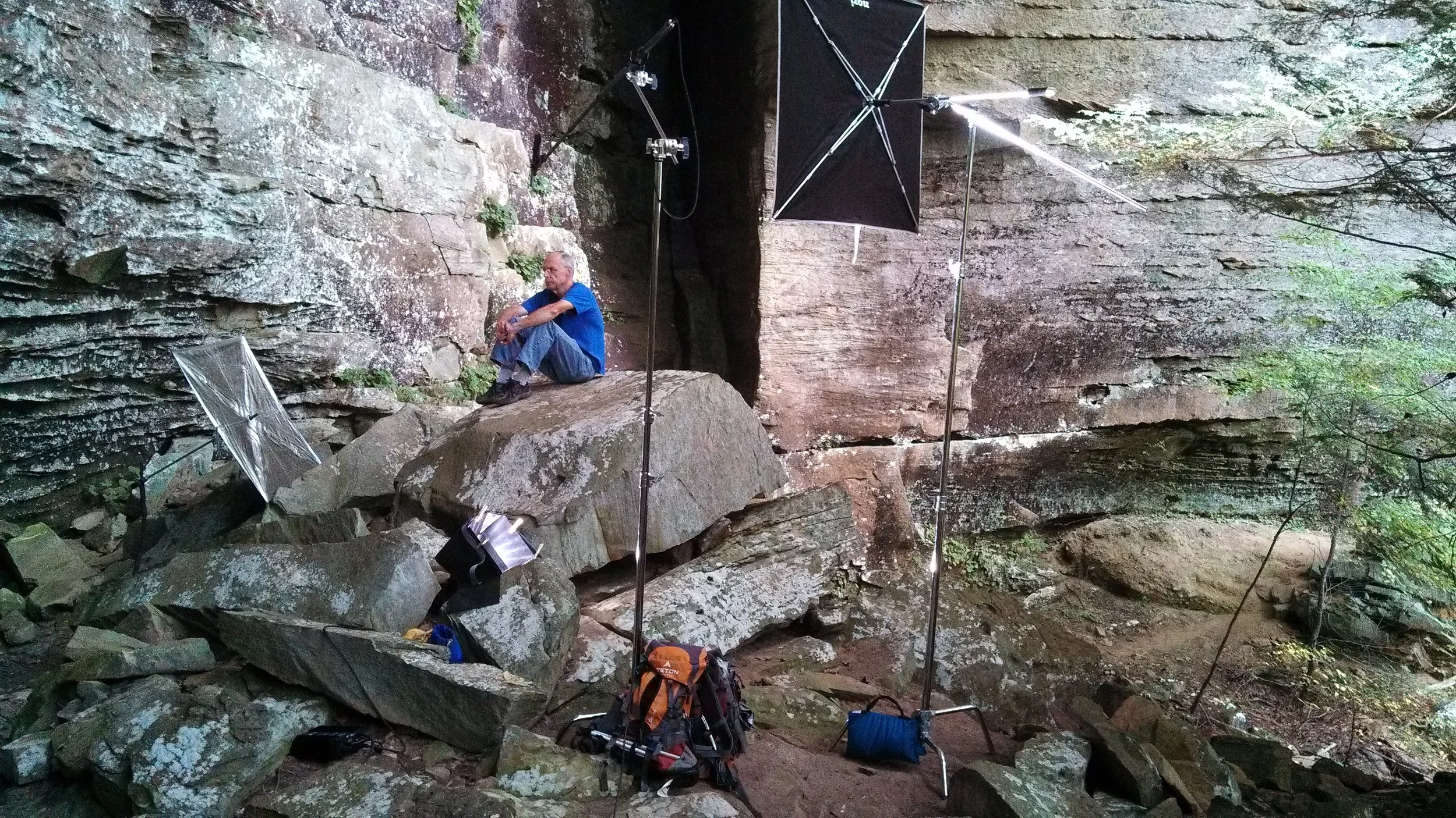 An interview set up in nature consists of a few reflectors and one light. Even backpacks weighed down with rocks or other heavy objects take the place of sandbags. Get creative.
