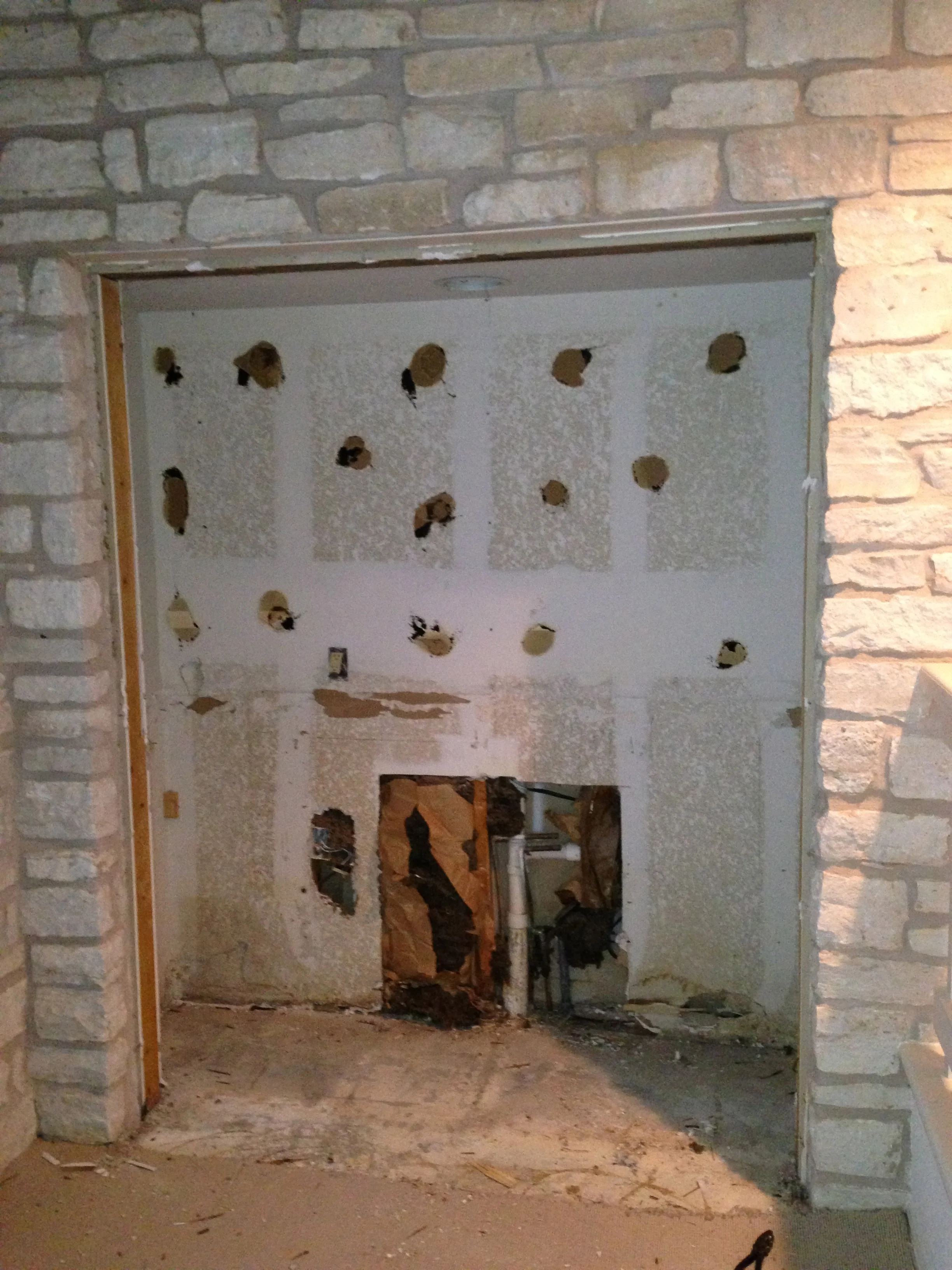 The old built-in located in the Master Bedroom is gone and along with it two of the most insane laundry hampers I have ever seen. They were completely inaccessible by anyone other than a giant squid. It will be replaced by a chest containing workout clothes and a great flat screen TV.