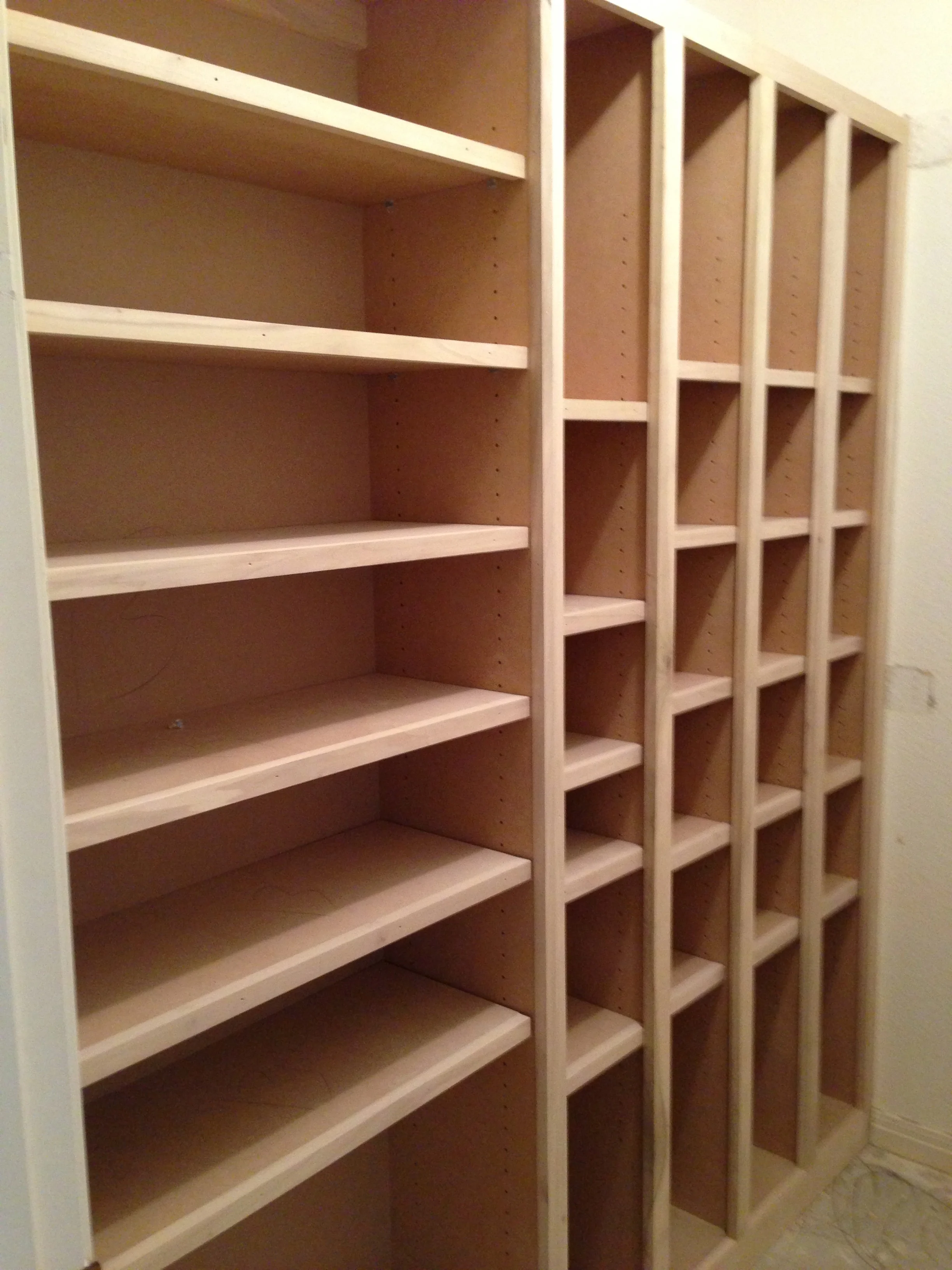 The first half of the Shoe and Boot Closet has been placed. Specialized hanging for the Client's scarf collection and bench are yet to be installed.