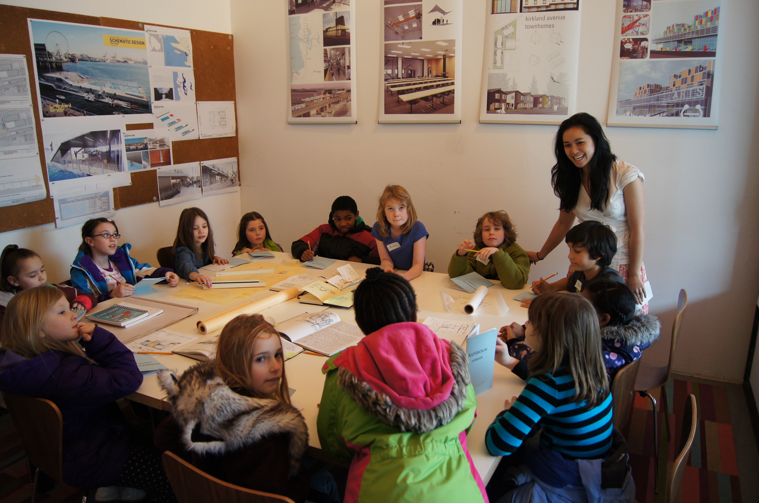 Mira leading a tour of Lowell Elementary Students through the Schemata Office