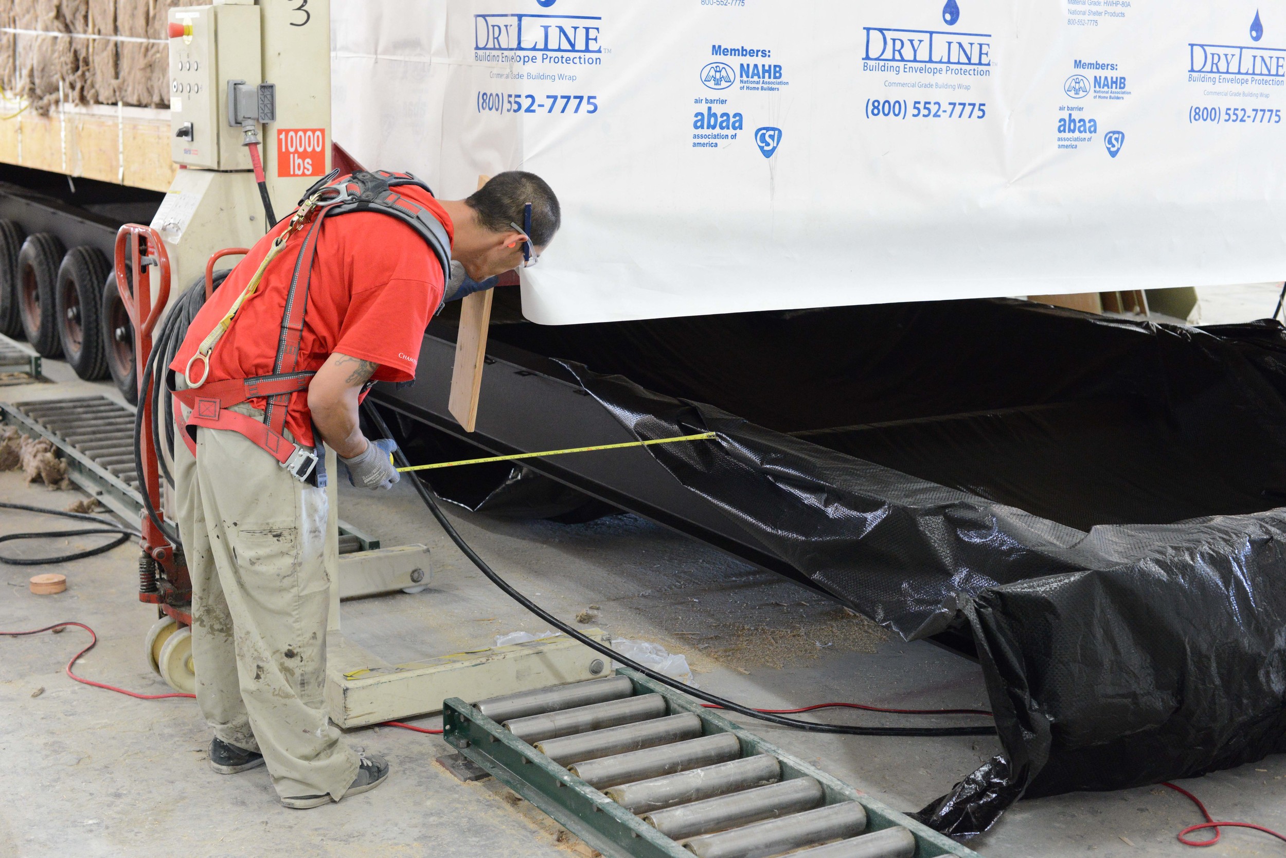 Careful attention is given to ensure that the module is set squarely on the trailer so the load is fully balanced during transport.