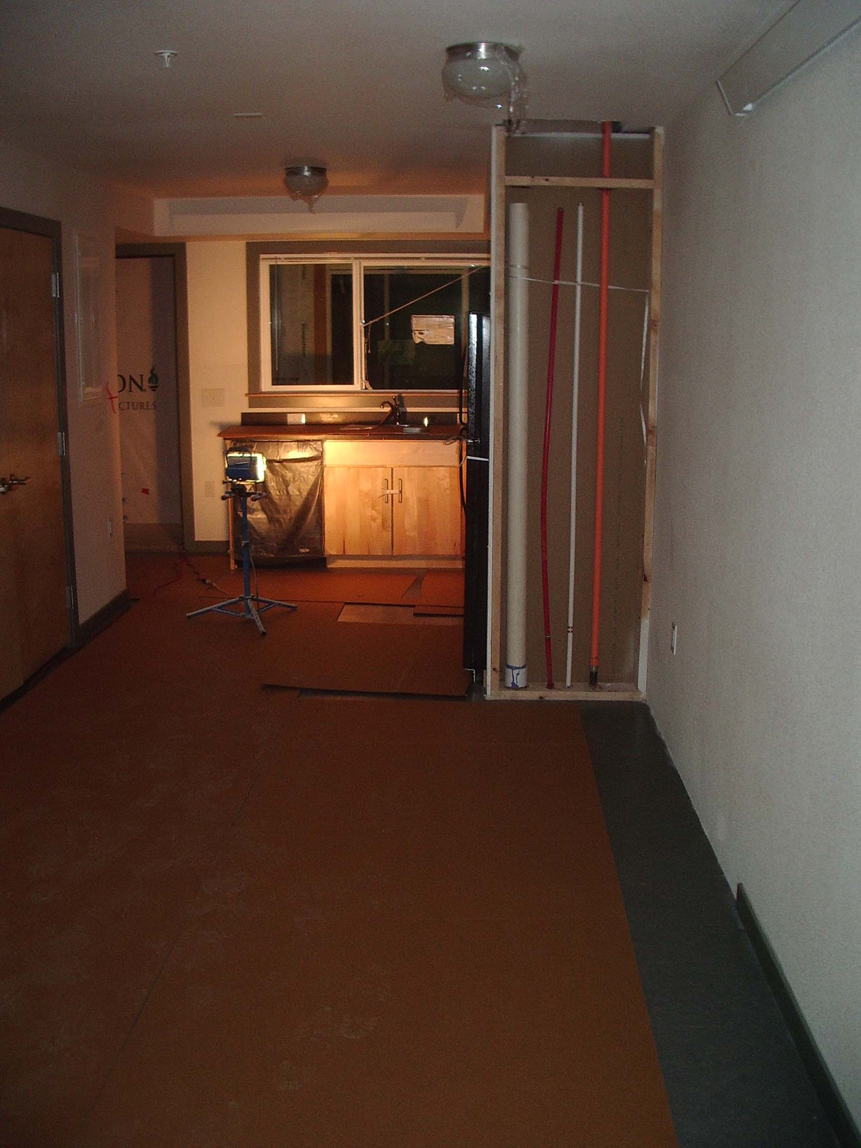 On that note, here you can see the missing drywall that was intentionally left off to allow for first floor to second floor plumbing connections. This section of drywall would need to be finished in the field.