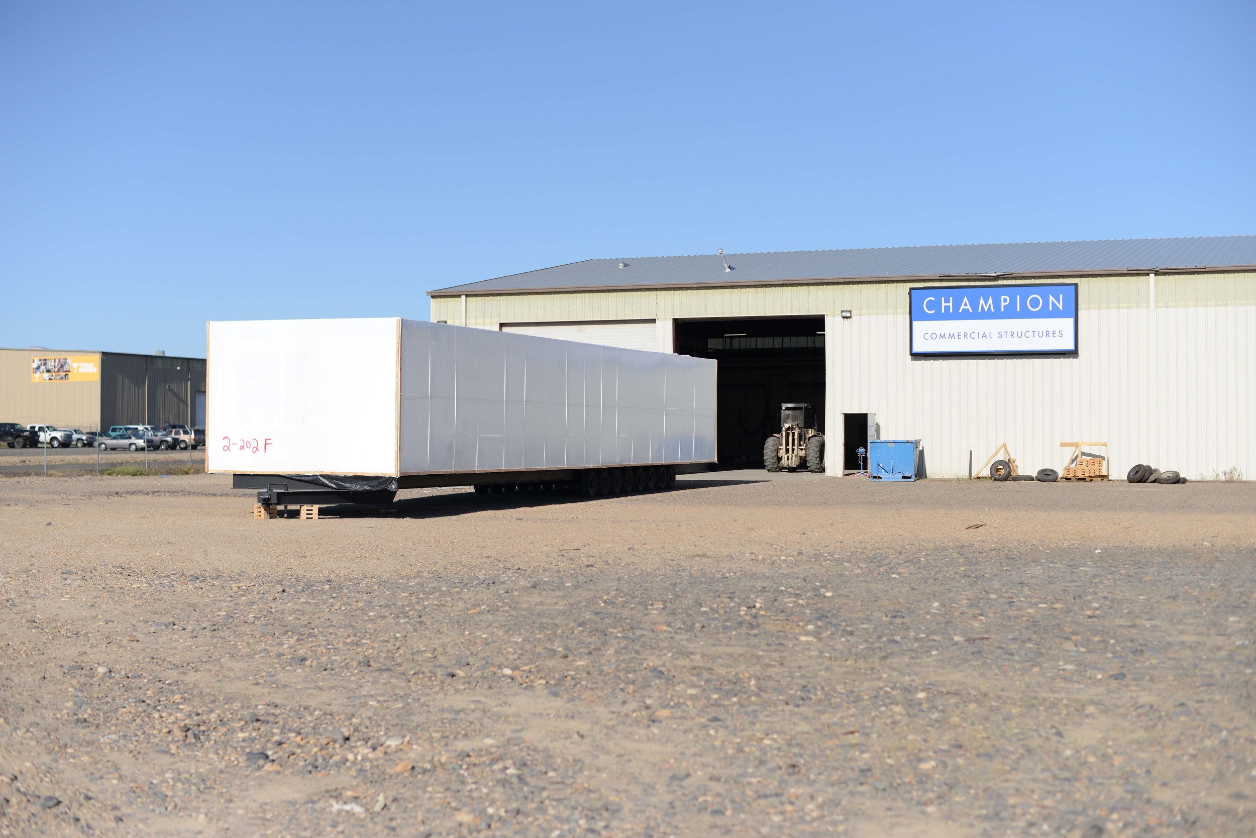The boxes are brought out of the factory and await pickup to be shipped to their final destination, Renton, Wa.