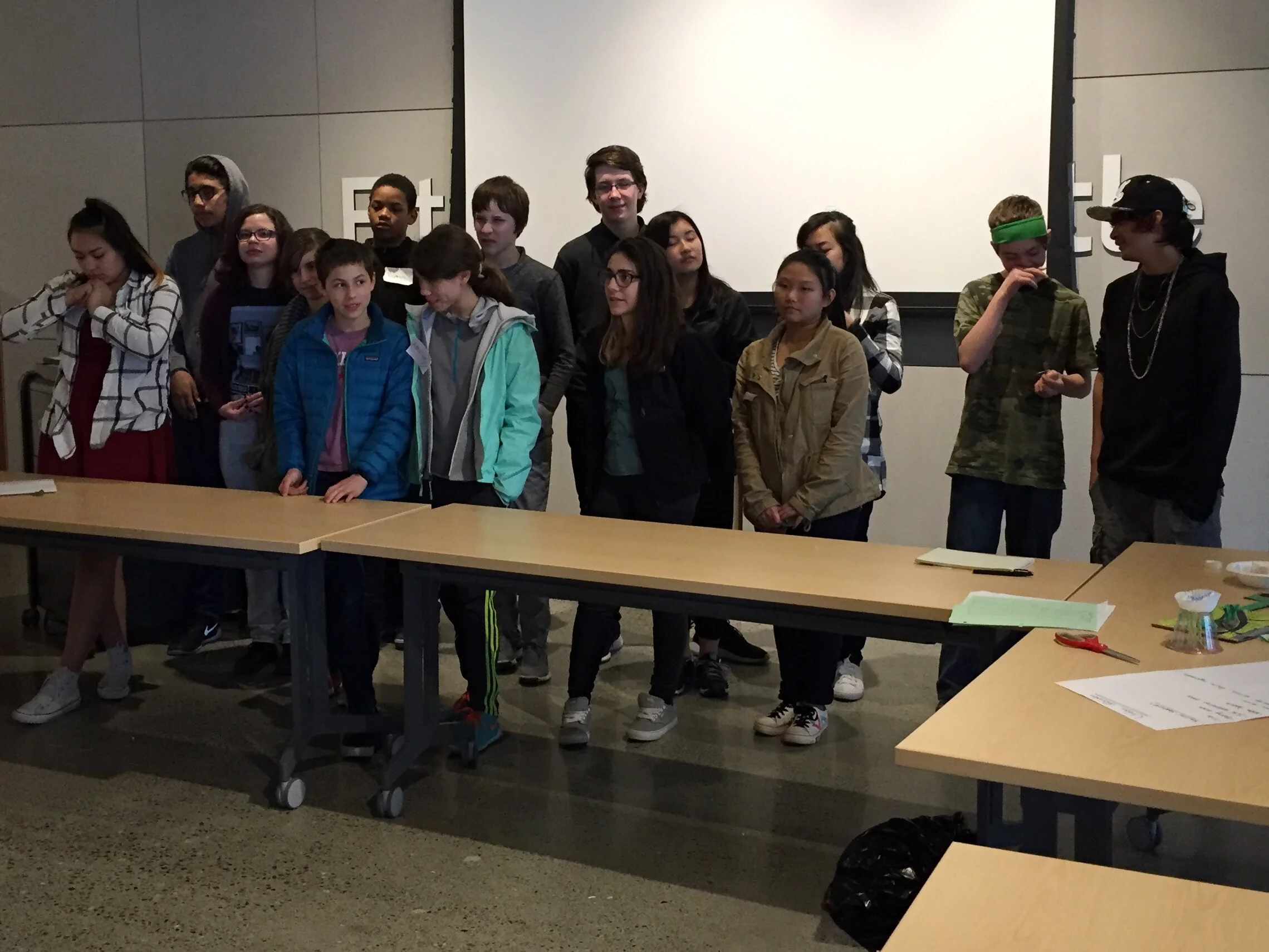 A bunch of tuckered out teens after the workshop, thinking, "Not another photo!"