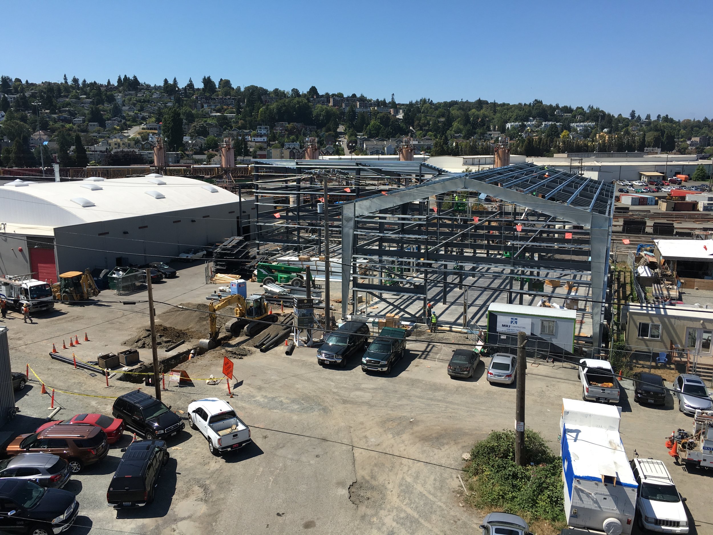 Aerial view of R&D Building steel PEMB frame from adjacent rooftop.