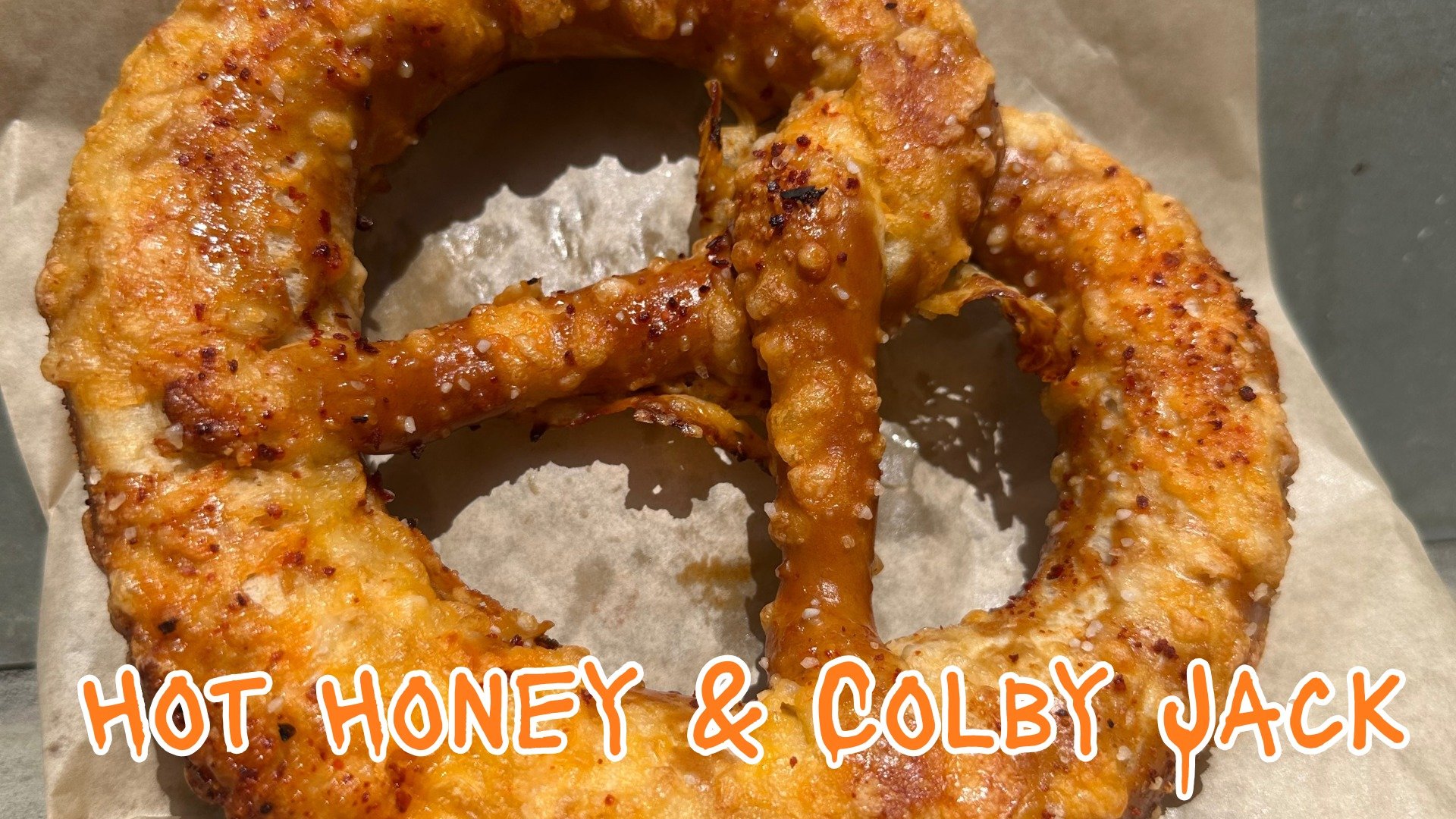 🔥🥨 New Pretzel Alert: Hot Honey &amp; Colby Jack 🧀🍯

Made with our original dough, proofed and dipped the old-fashioned way&mdash;then things heat up. We top it with pretzel salt, a generous layer of Colby Jack cheese, and a spicy-sweet hit of Ho