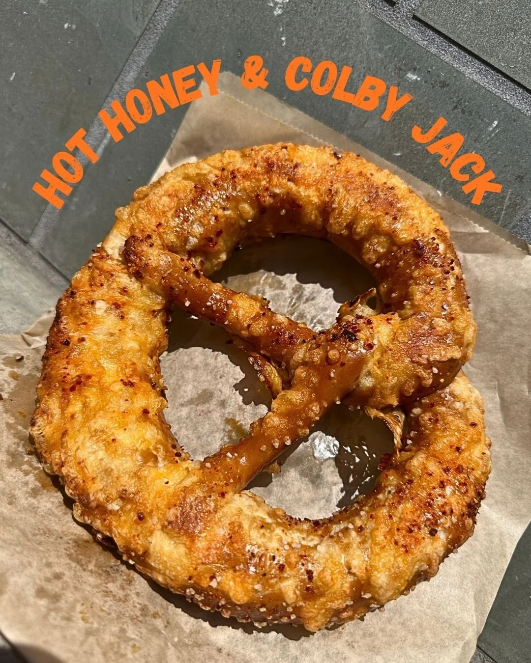 🌶️☀️ Hot Honey, Hotter Weather ☀️🌶️

The sun&rsquo;s finally showing up and so is our Hot Honey &amp; Colby Jack Pretzel! Made with our original dough, topped with melty colby jack and a bold sprinkle of Hot Honey Spice from North Market Spices, th