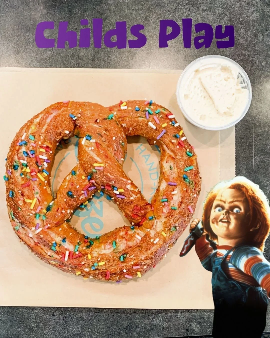 🔪🎈 WANNA PLAY? 🎈🔪 

Don't let the sprinkles fool you&hellip; this pretzel is dangerously delicious! 😈🍭

Our Child's Play Pretzel is back and bringing a little sweetness to spooky season! We take our classic dough and mix in extra sugar, vanilla