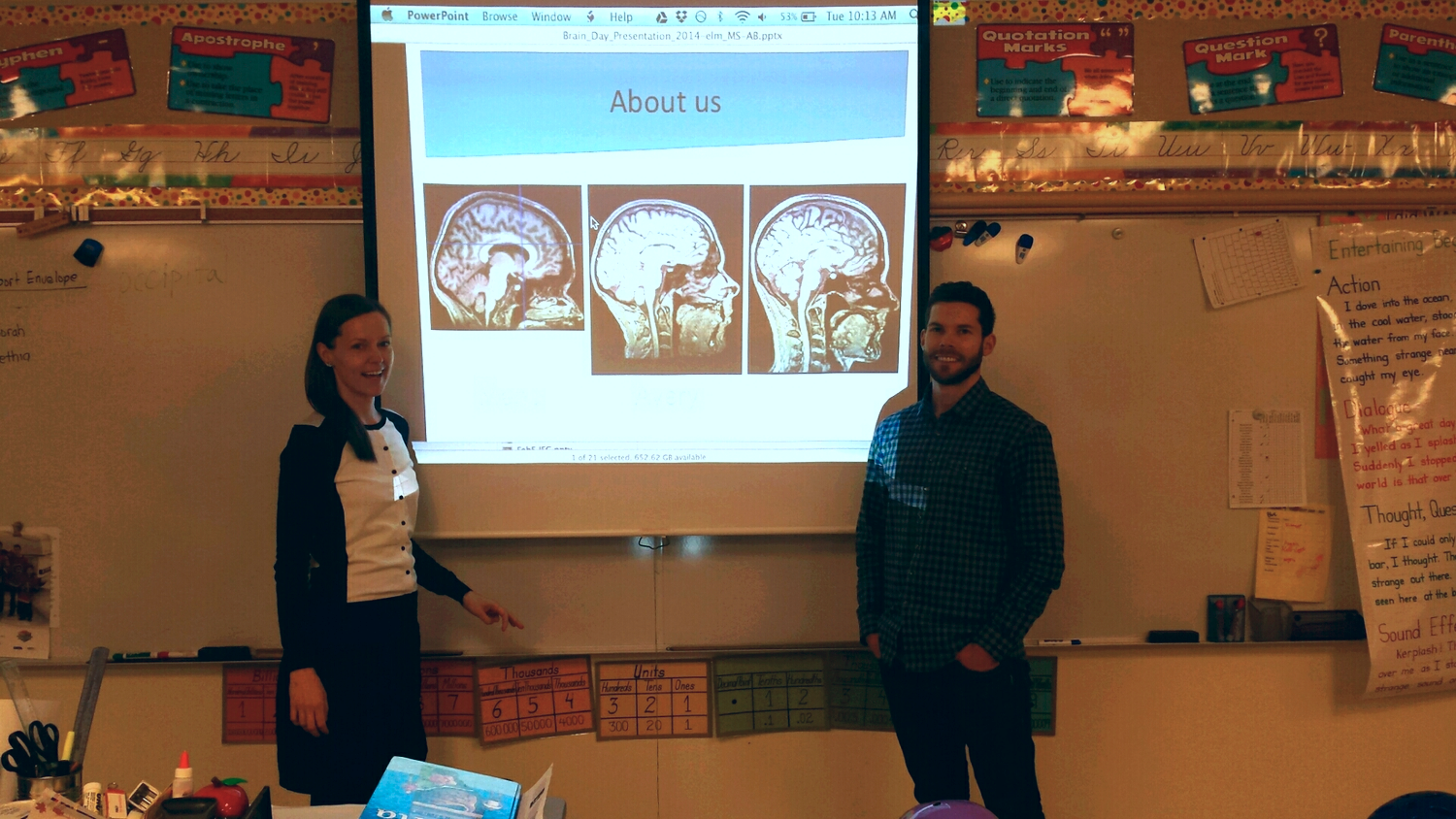 Manu and Avery from Bruce Pike's lab . We introduced ourselves with our own MRI images and had the kids guess which brain is from whom. 