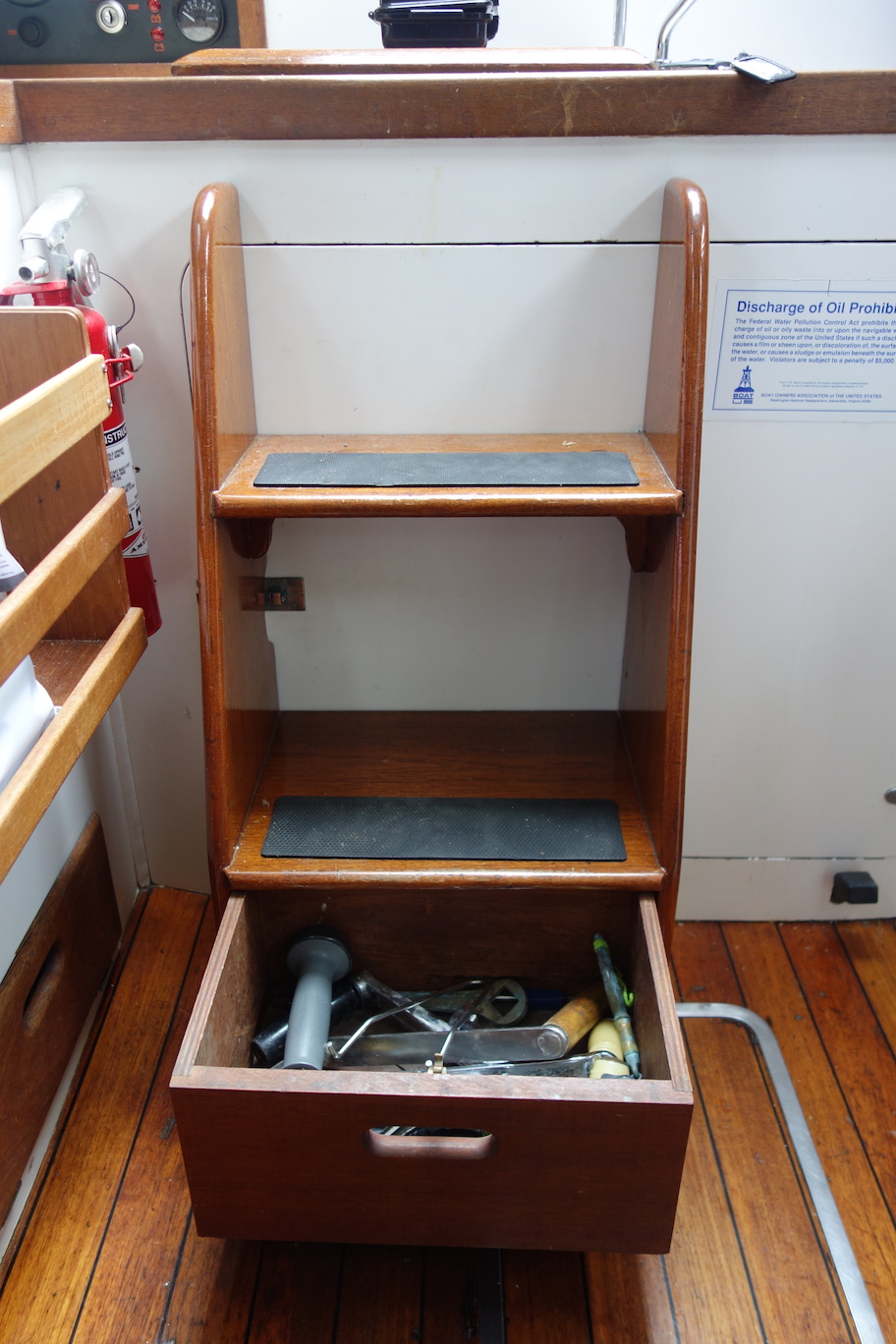  Clever drawer under the steps for winch handles and such. 