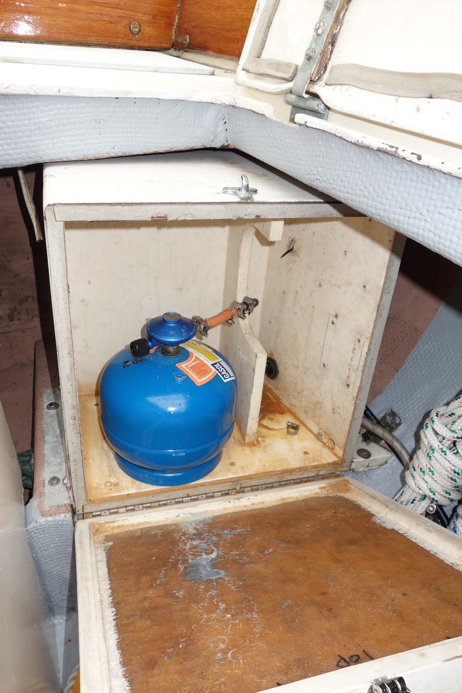  Propane locker in port cockpit locker. 