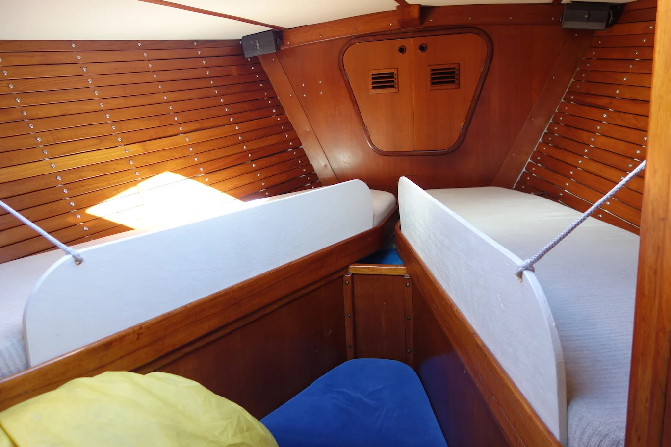 Vee-berth bunks with lee boards.