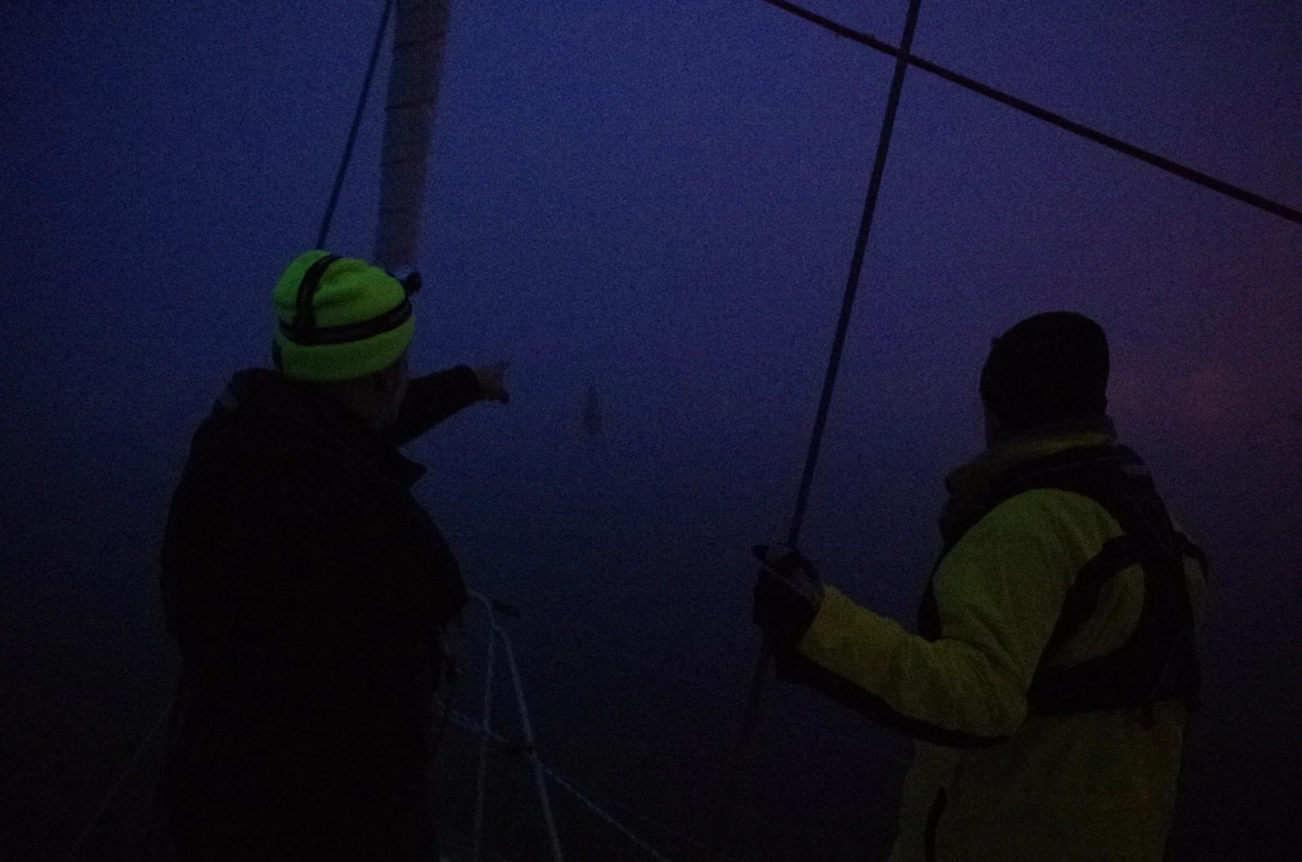 Dan (left) and Doug (right), spotting on the bow as we entered St. Pierre in the fog.