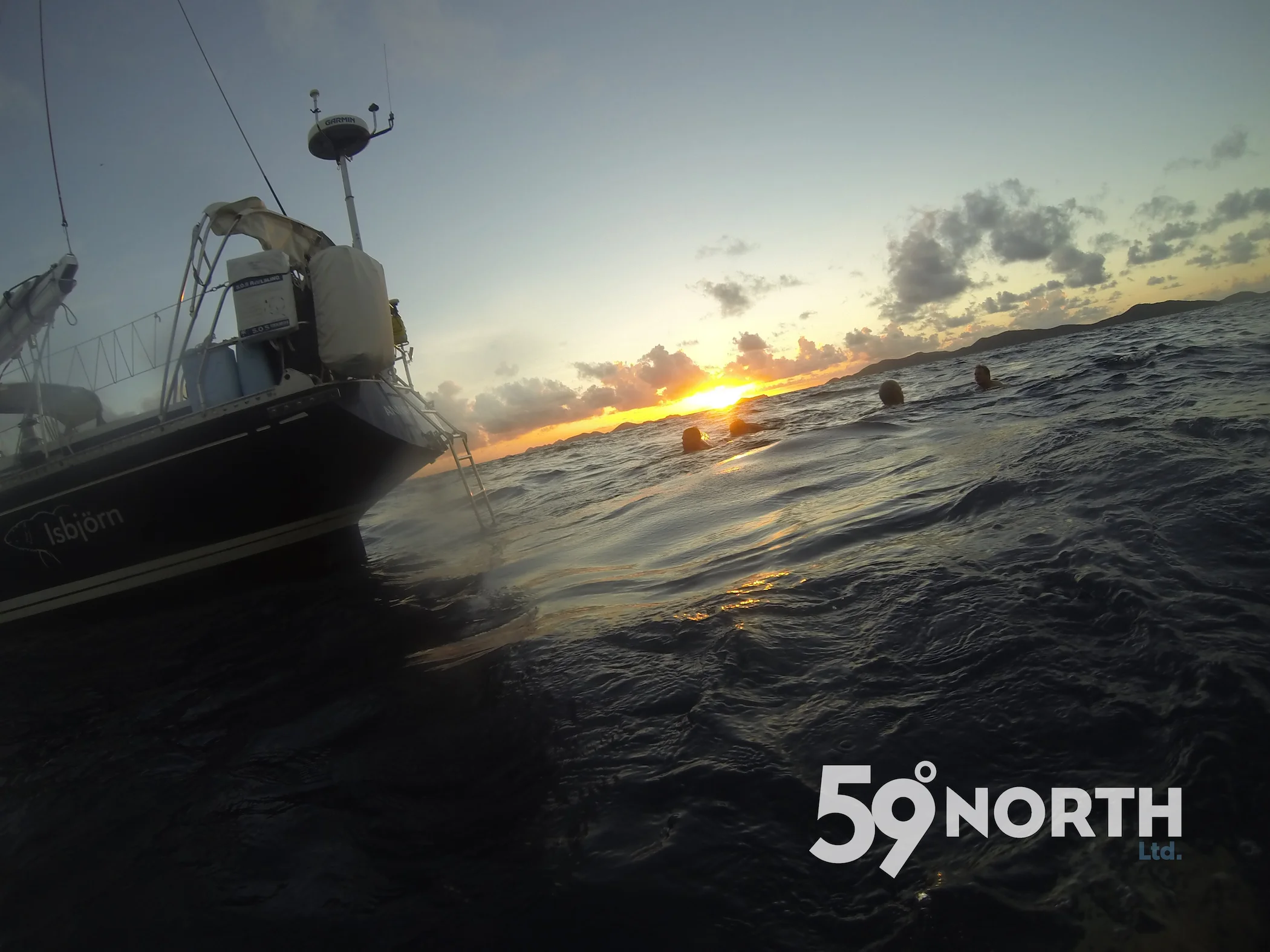 Swimming during moonset and sunrise after we crossed the finish line and before entering the marina!
