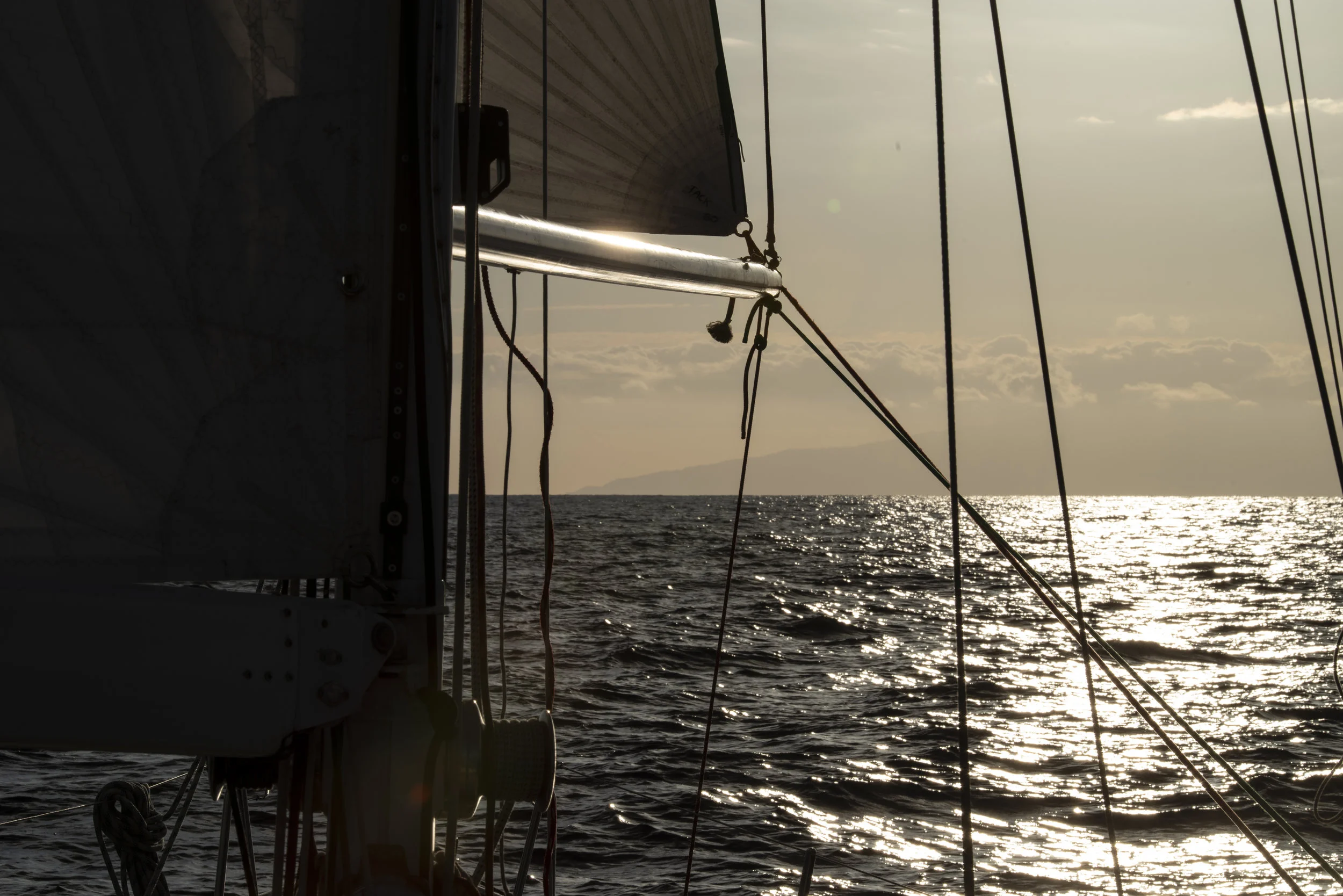 Madeira rises up out of the sunset haze.