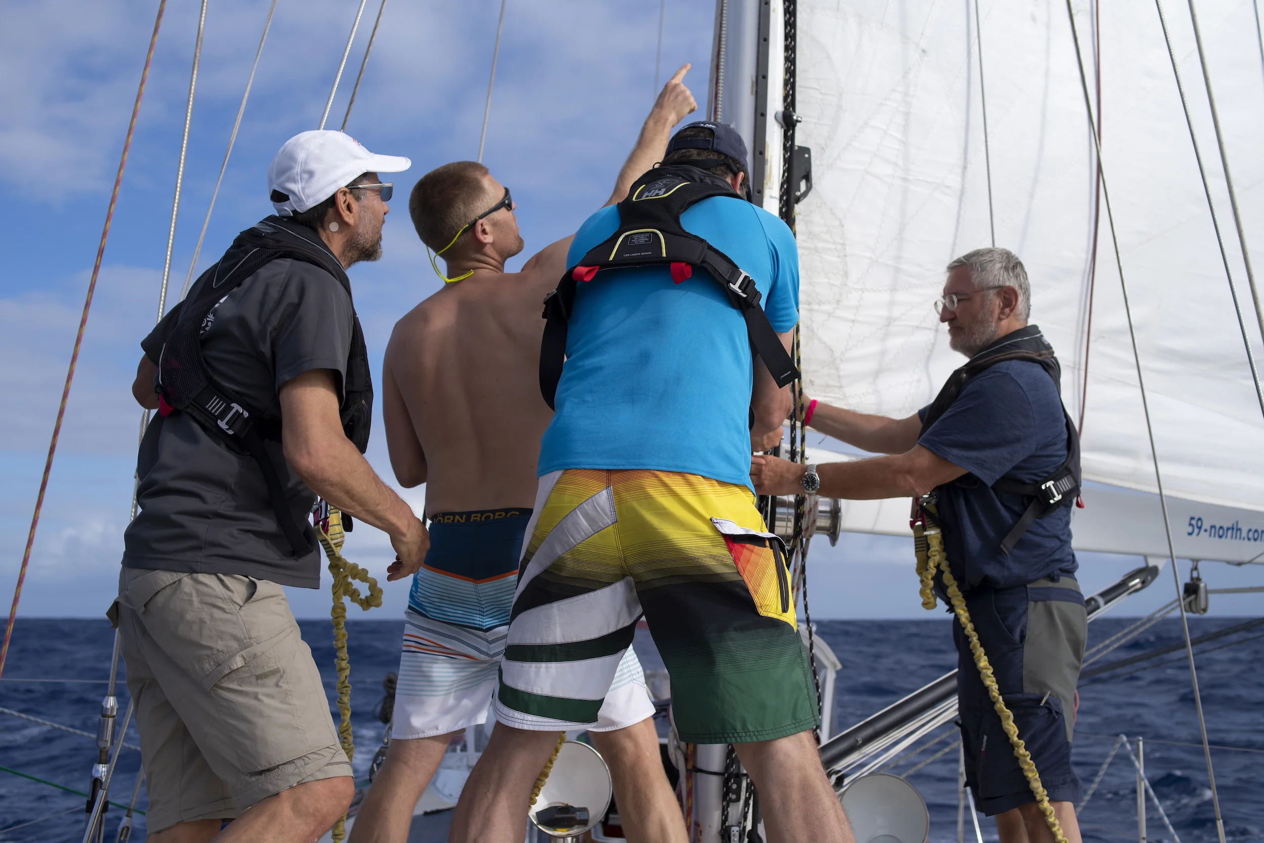 How many ISBJORN crew does it take to fix the genoa track?