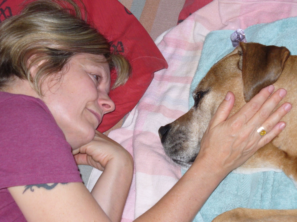 Ute with her soul dog Shiva during his last moments before passing.