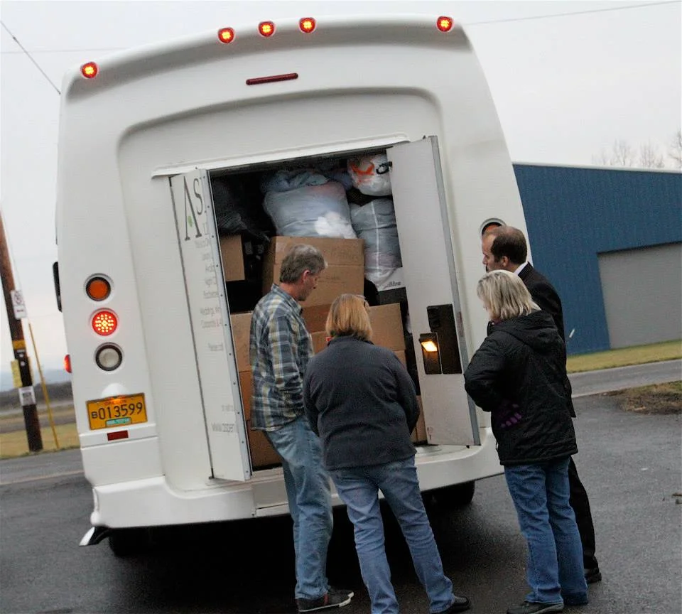 The back of the bus was loaded with gifts as well as a pickup full of goods which followed behind the bus.