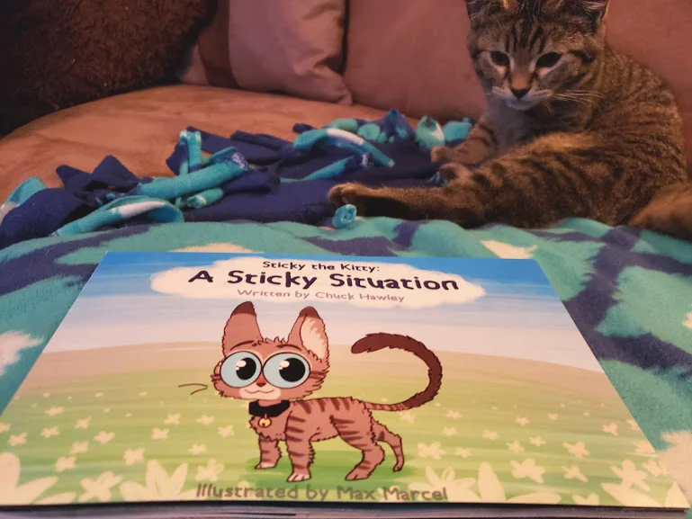 Sticky+looking+up+with+his+book.jpg