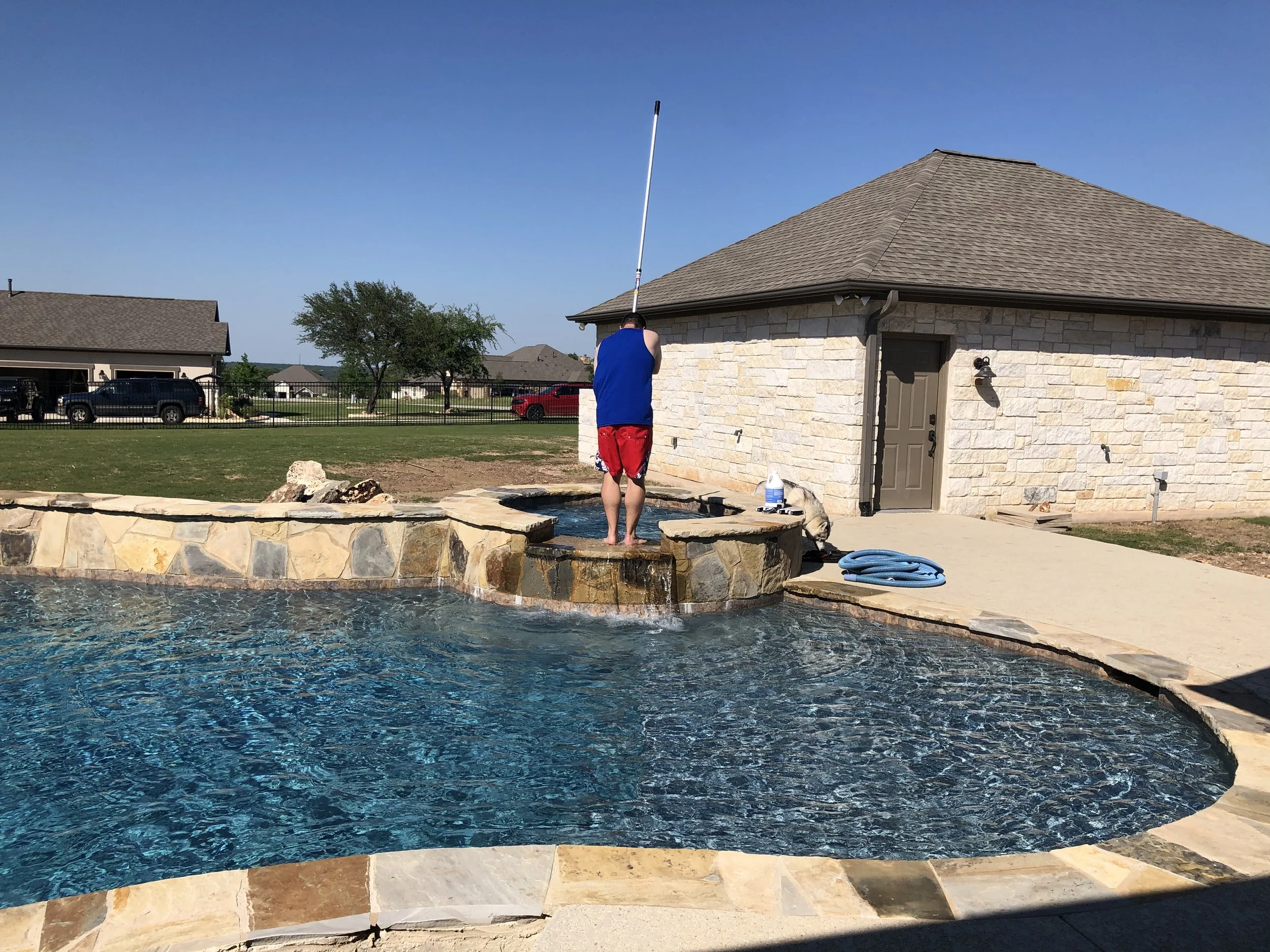 Cleaning the pool is hard work