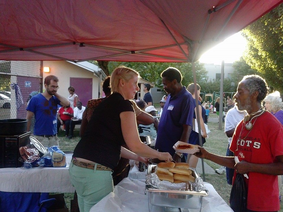  BNA board member Jessie Blanchard serves up BBQ with Oreatha Johnson from Integrity Catering. 