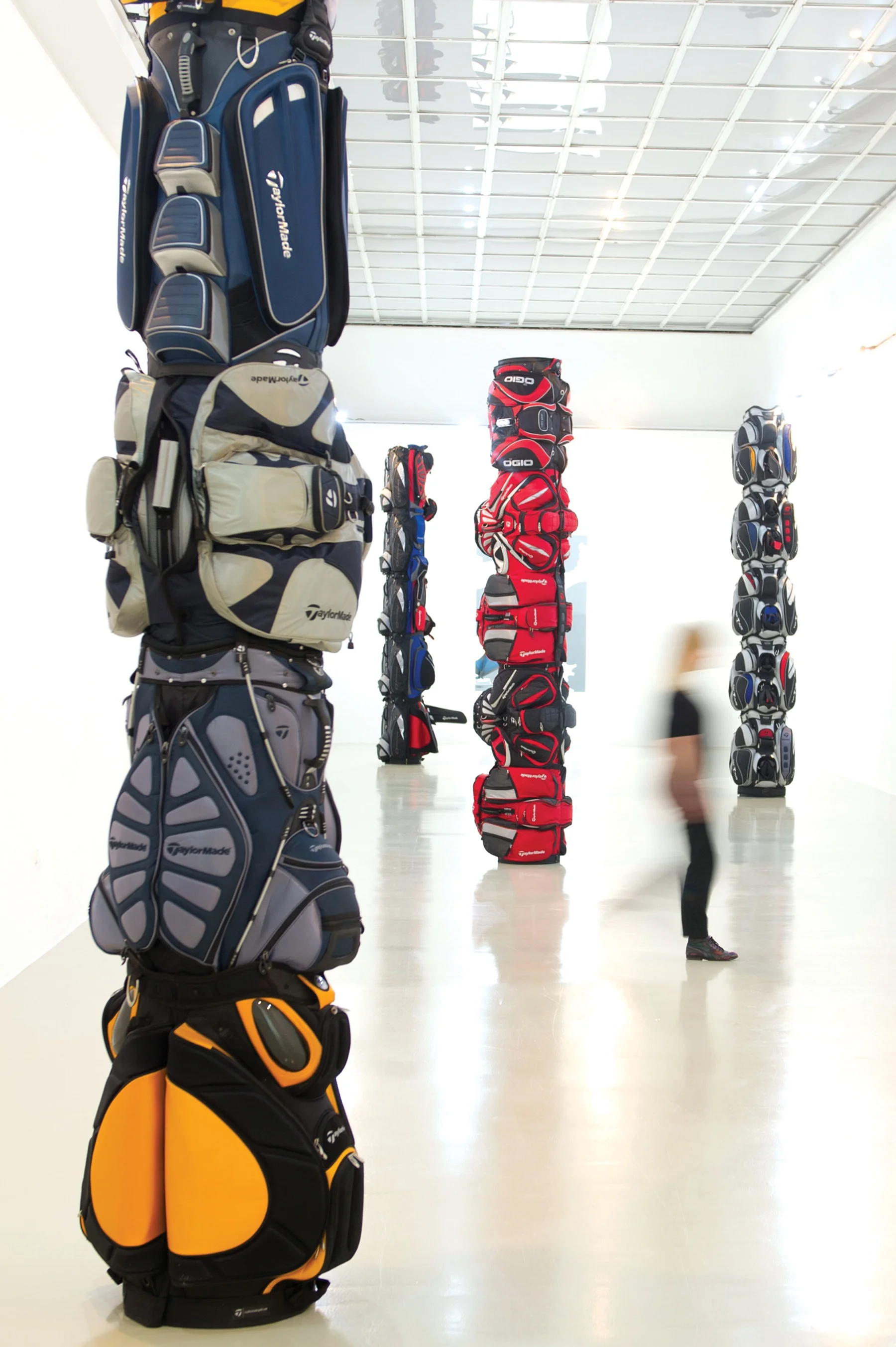 Totem poles by Canadian artist Brian Jungen, made from deconstructed golf bags