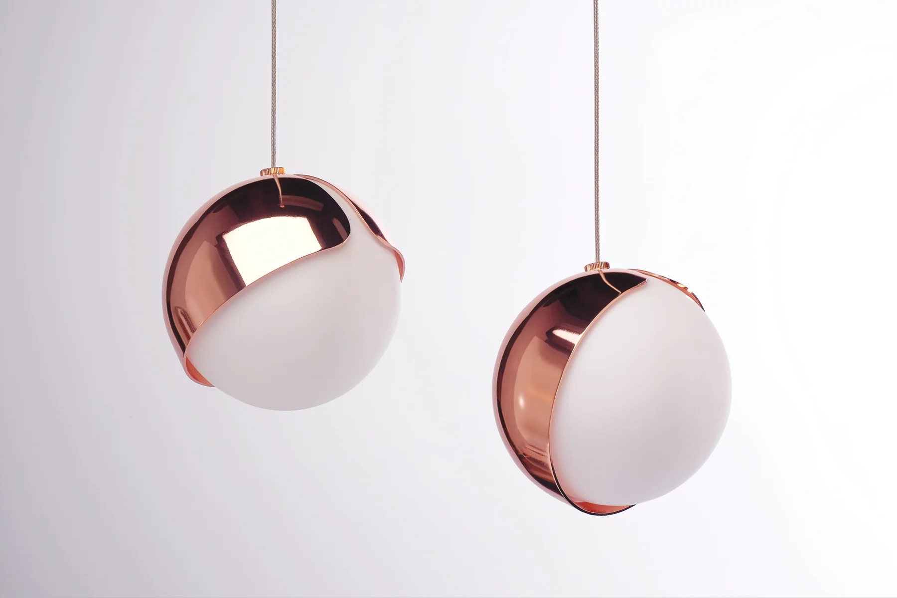 Toronto studio Anony’s Ohm pendant features an orbiting metal shade