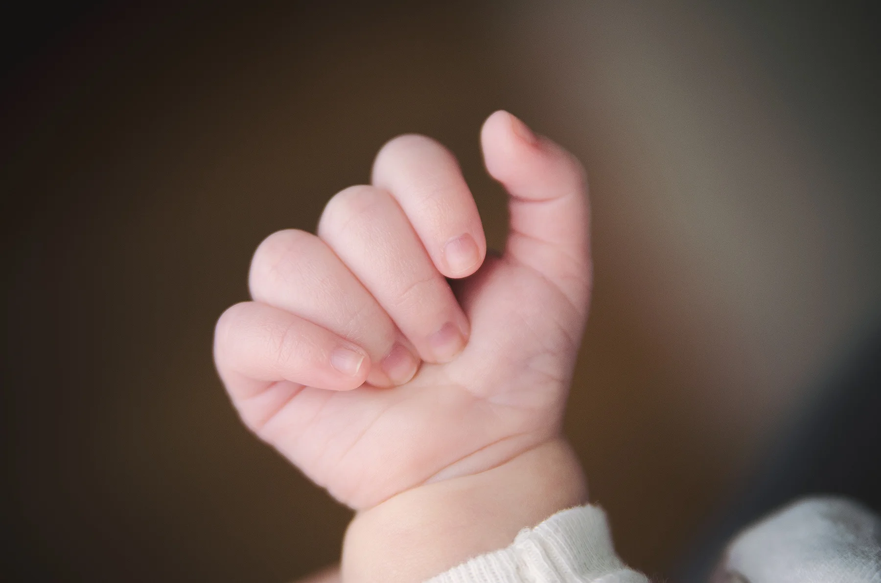 Love those little hands...most of the time she clutches them together up really close to her face. 