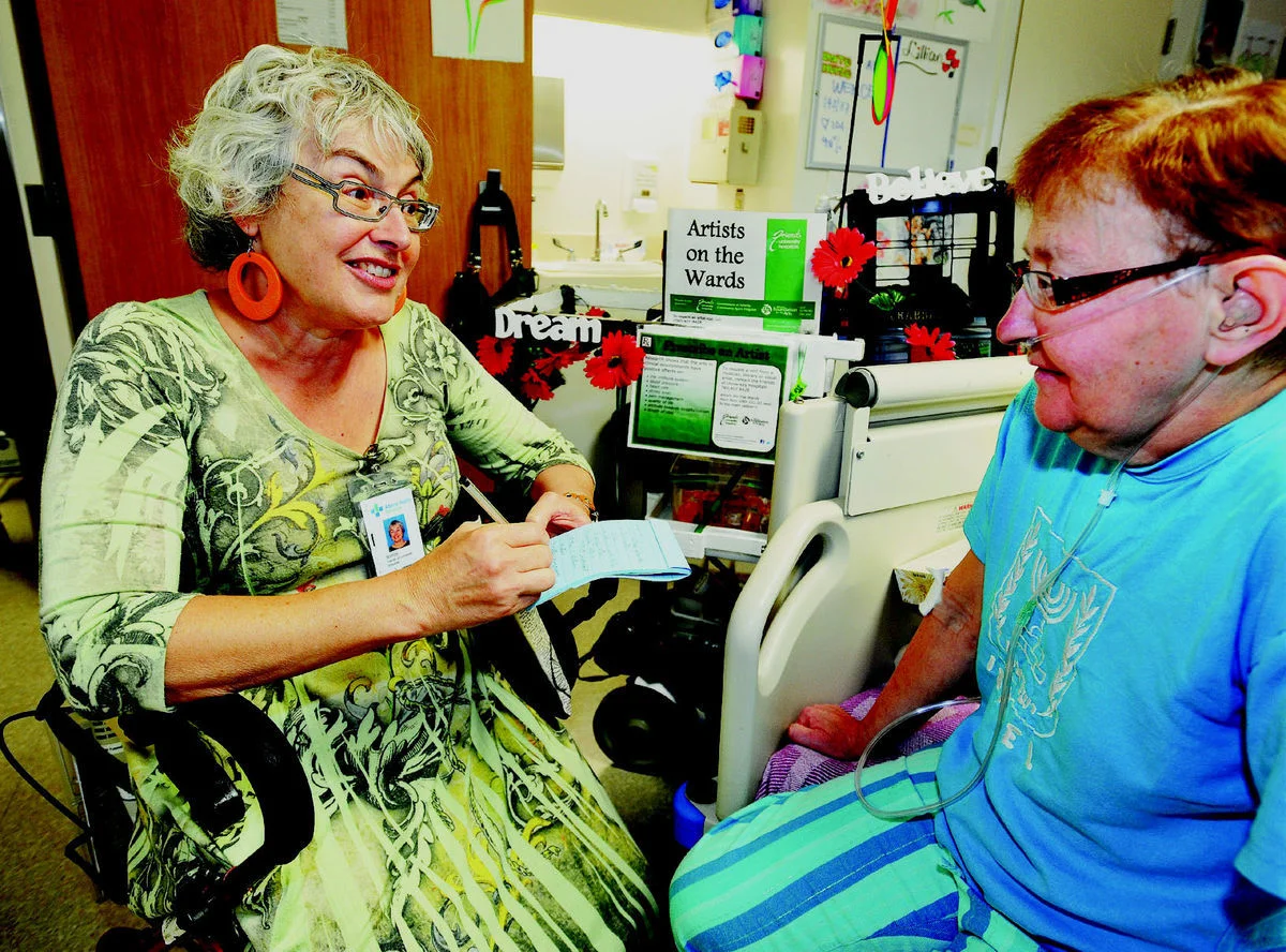 Poet Shirley Serviss visits University of Alberta Hospital patient Lillian Geddes as part of the hospital's Artists on the Wards program. Photo Credit: Ed Kaiser/Edmonton Journal