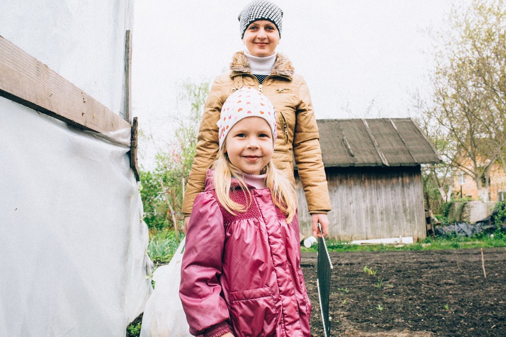 We went to the dacha (country garden). Maria and Olena.
