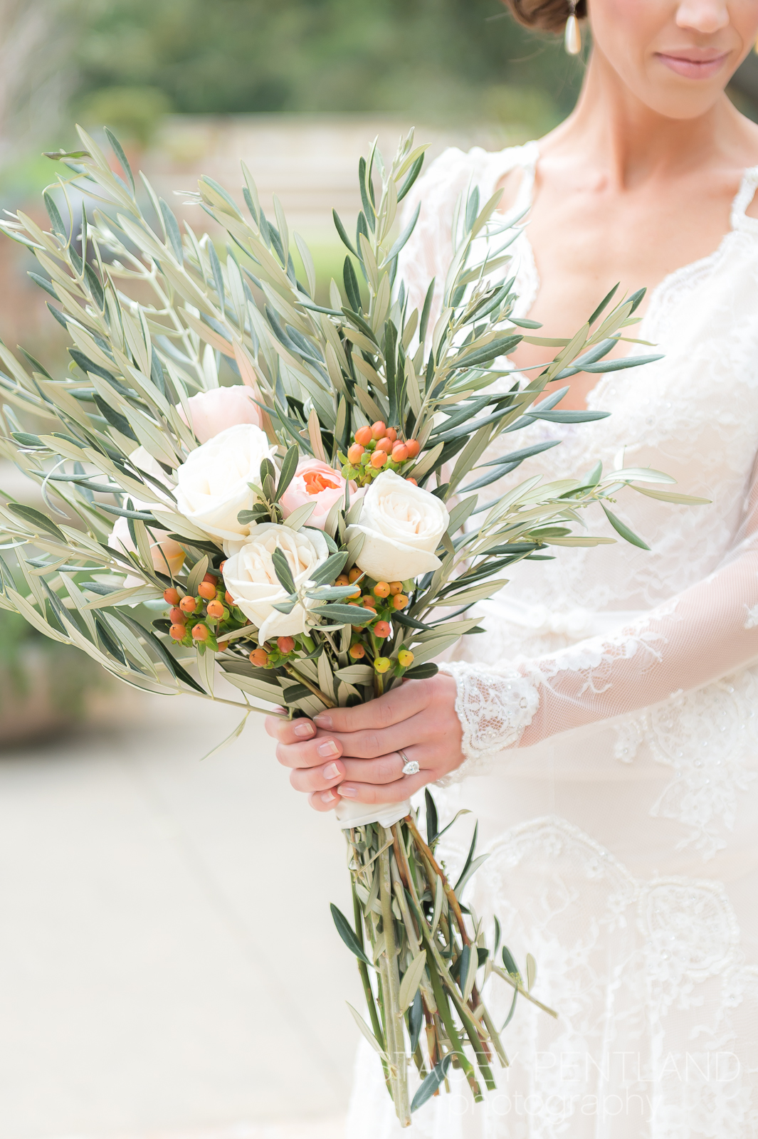 Pretty florals, the perfect combination of olive branches, roses and berries by Floral Designs by Reina .