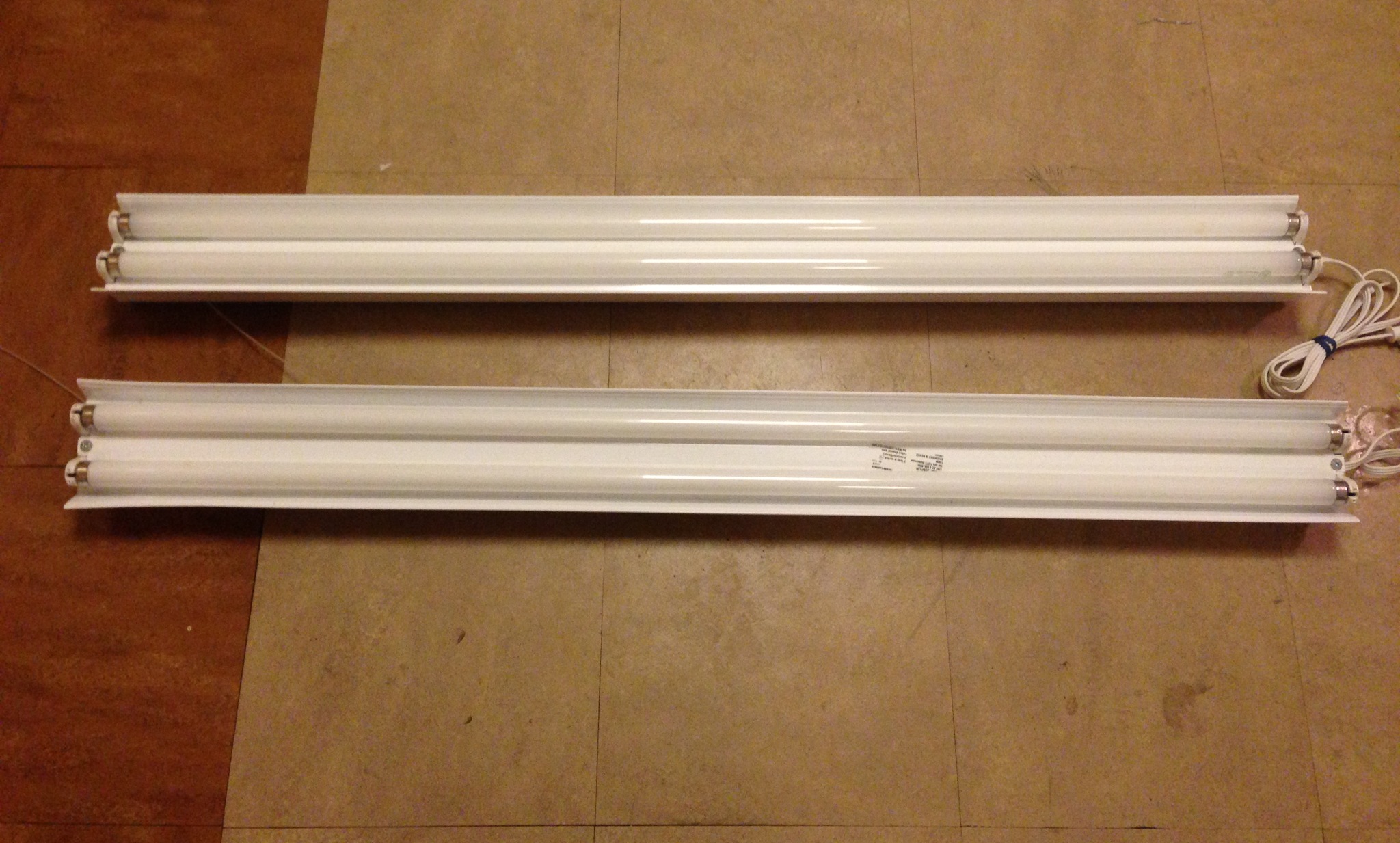 "4ft Fluorescent Lighting Bank" (2) 2 "T8" Bulb housing 64w each.