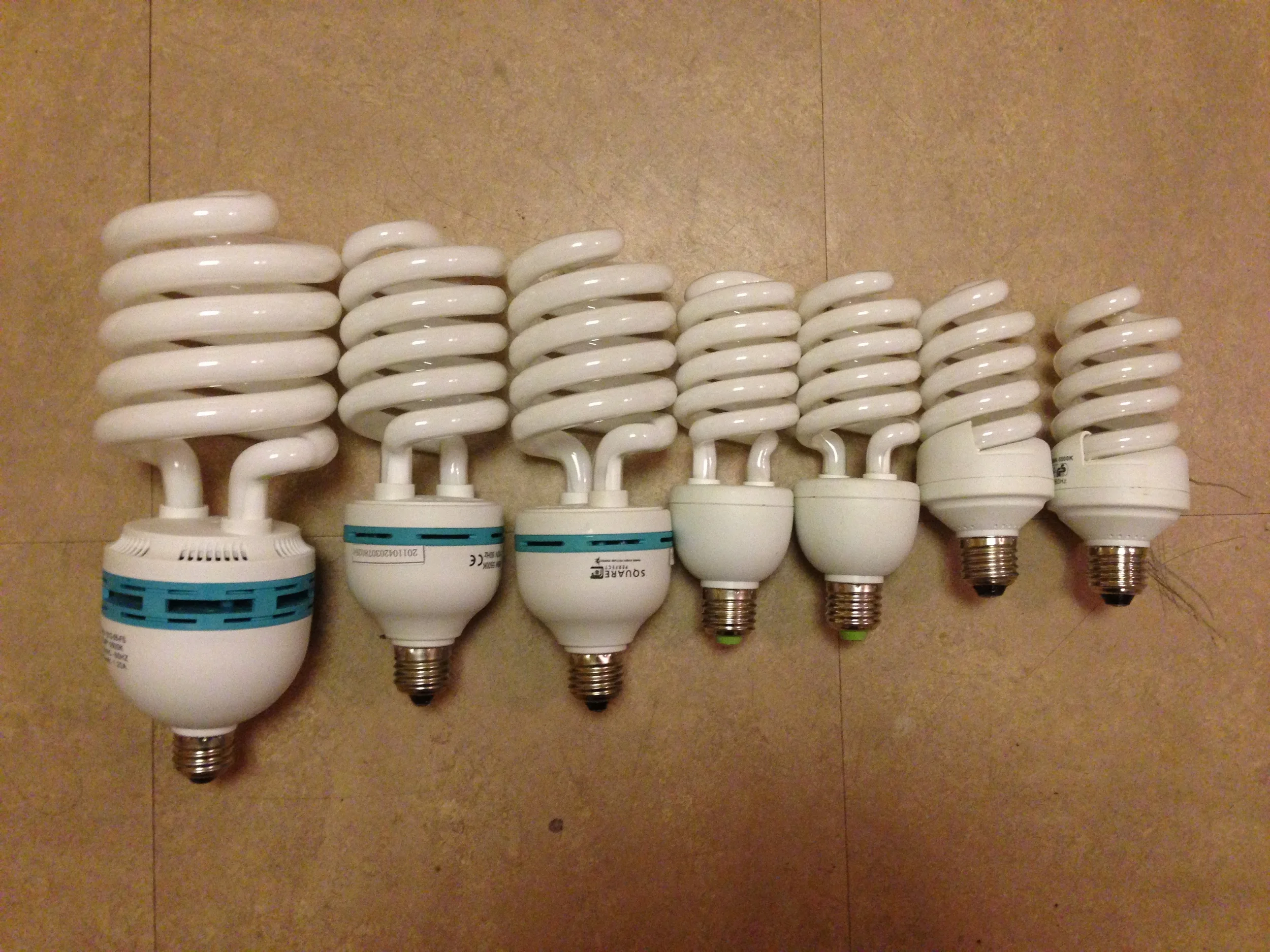 "Compact Fluorescent bulbs" (1) 85w, (2) 65w, (2) 45w, and (2) 25w (I never really use these guys)